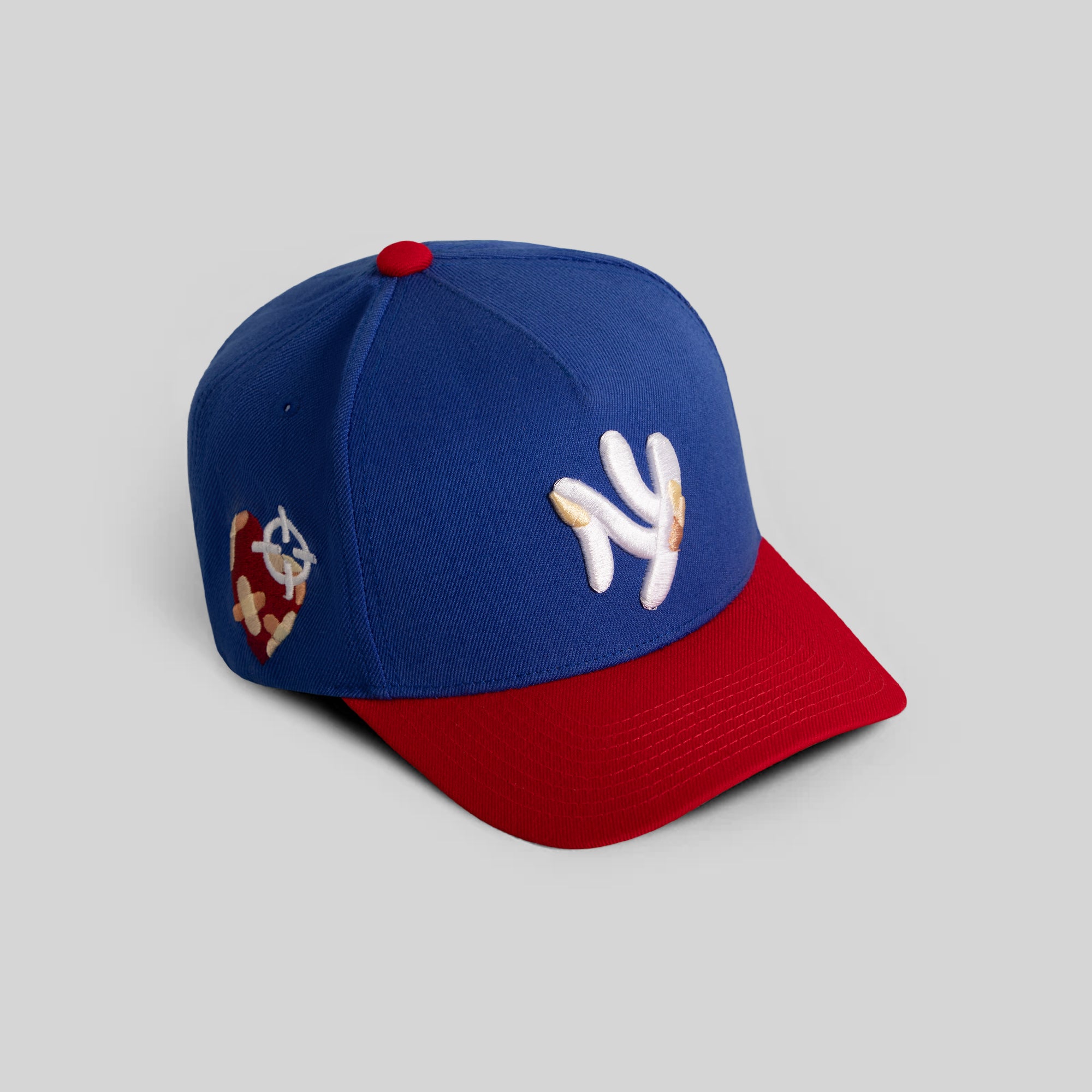 FIELD GRADE X KURVE STUDIO NY IS HEALING GAME ROYAL VARSITY RED TRUCKER