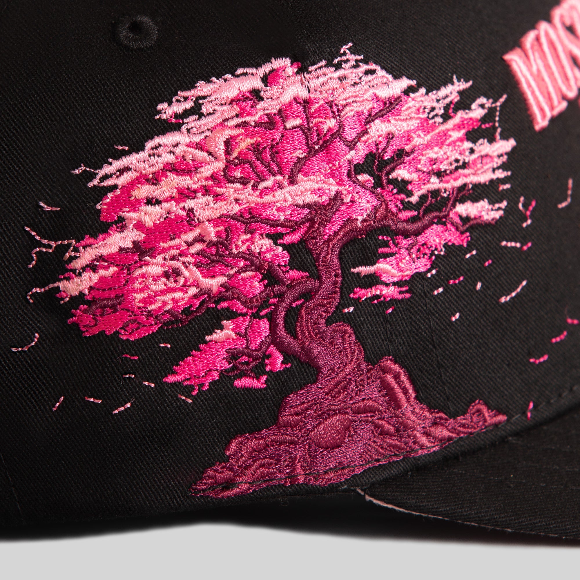 MOST LIKELY CHERRY BLOSSOM BLACK TWILL TRUCKER
