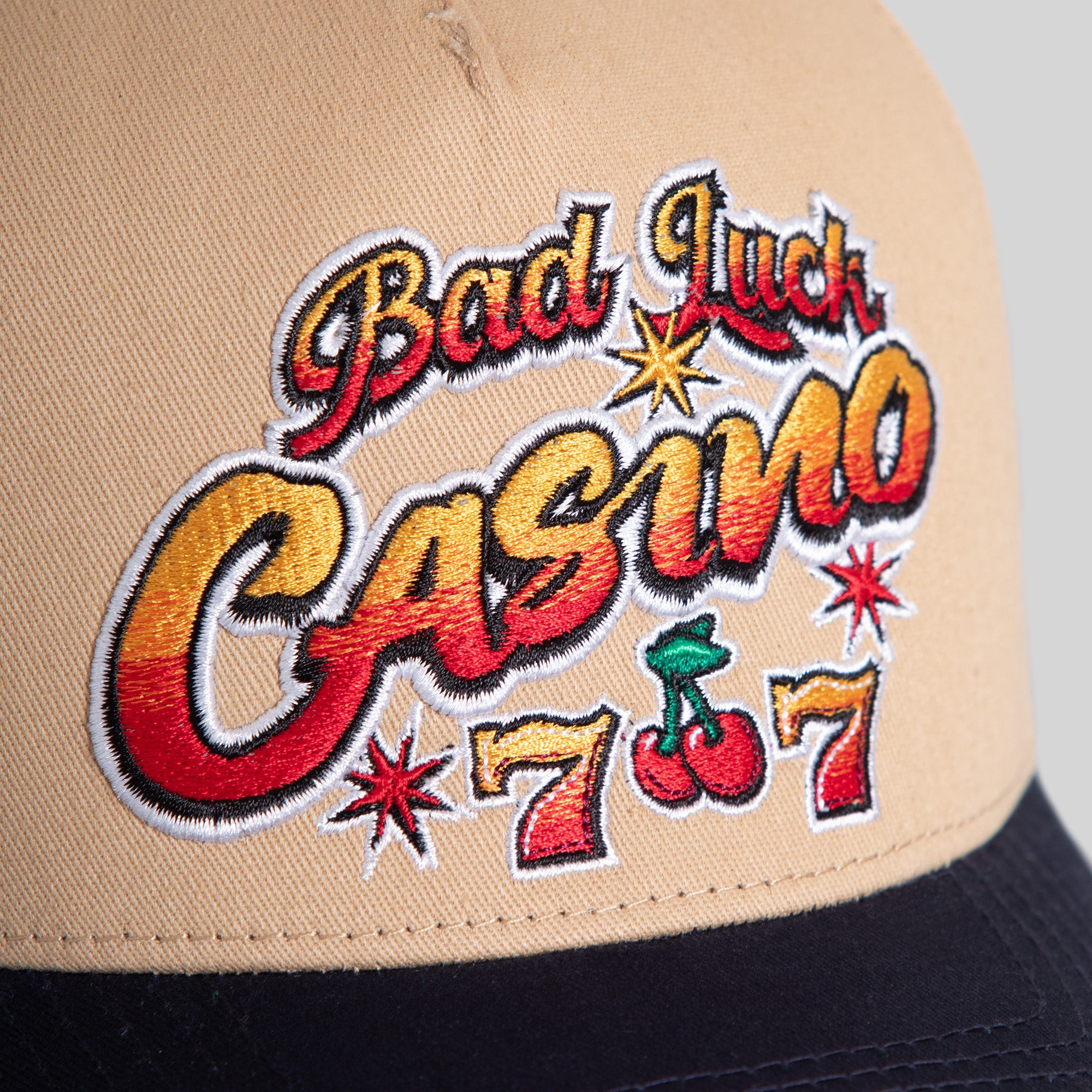 BAD LUCK CASINO TAUPE DEEP NAVY TWILL TRUCKER