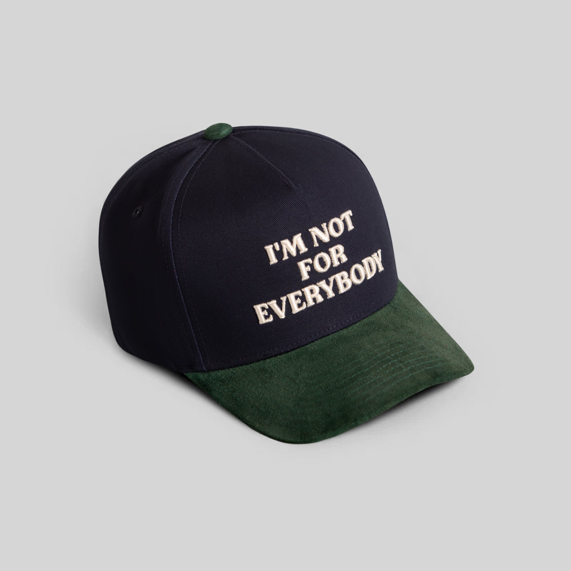 I'M NOT FOR EVERYBODY DEEP NAVY FG GREEN TWILL SUEDE TRUCKER