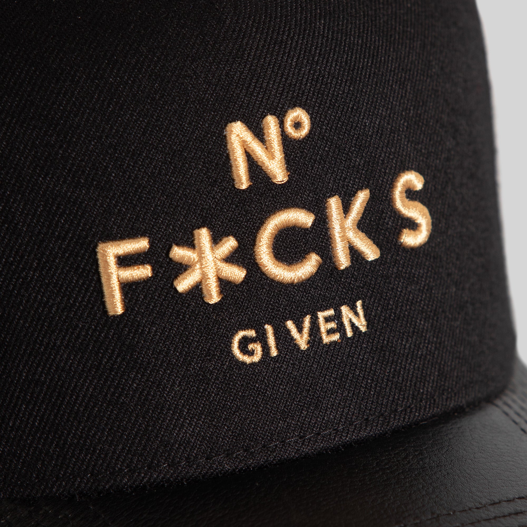NO F*CKS GIVEN BLACK WOOL LEATHER TRUCKER