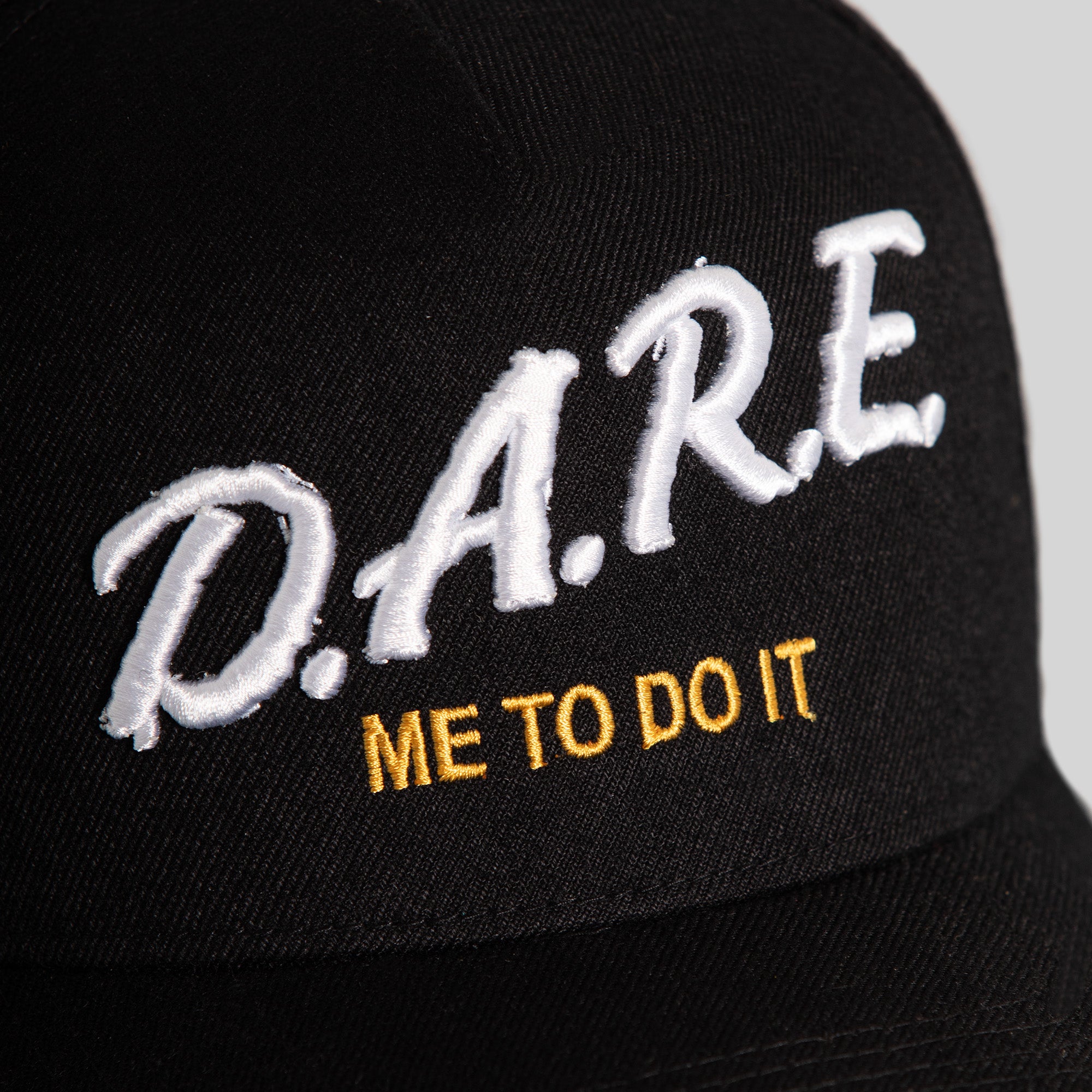 DARE ME TO DO IT 2.0  MARIGOLD BLACK WOOL TRUCKER