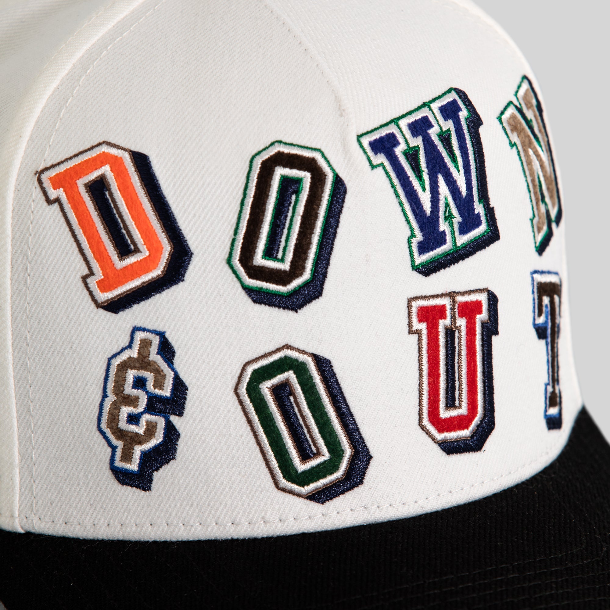 DOWN AND OUT OFF WHITE BLACK WOOL TRUCKER