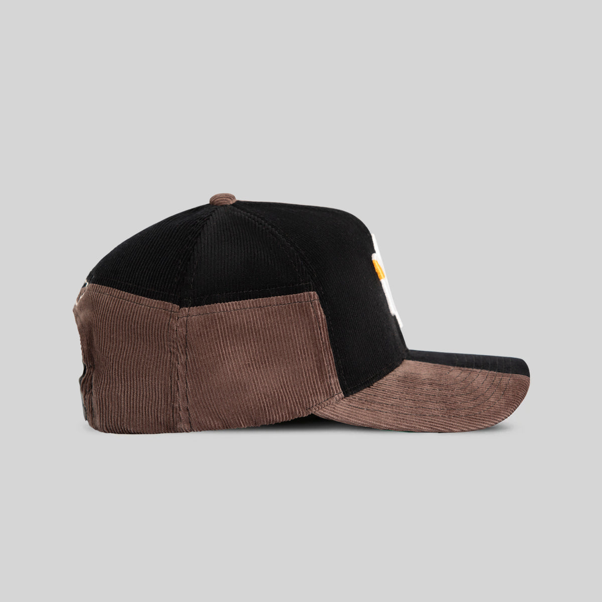 FIELD GRADE X KURVE STUDIO NY IS HEALING MULTI CORDUROY PATCHWORK TRUCKER