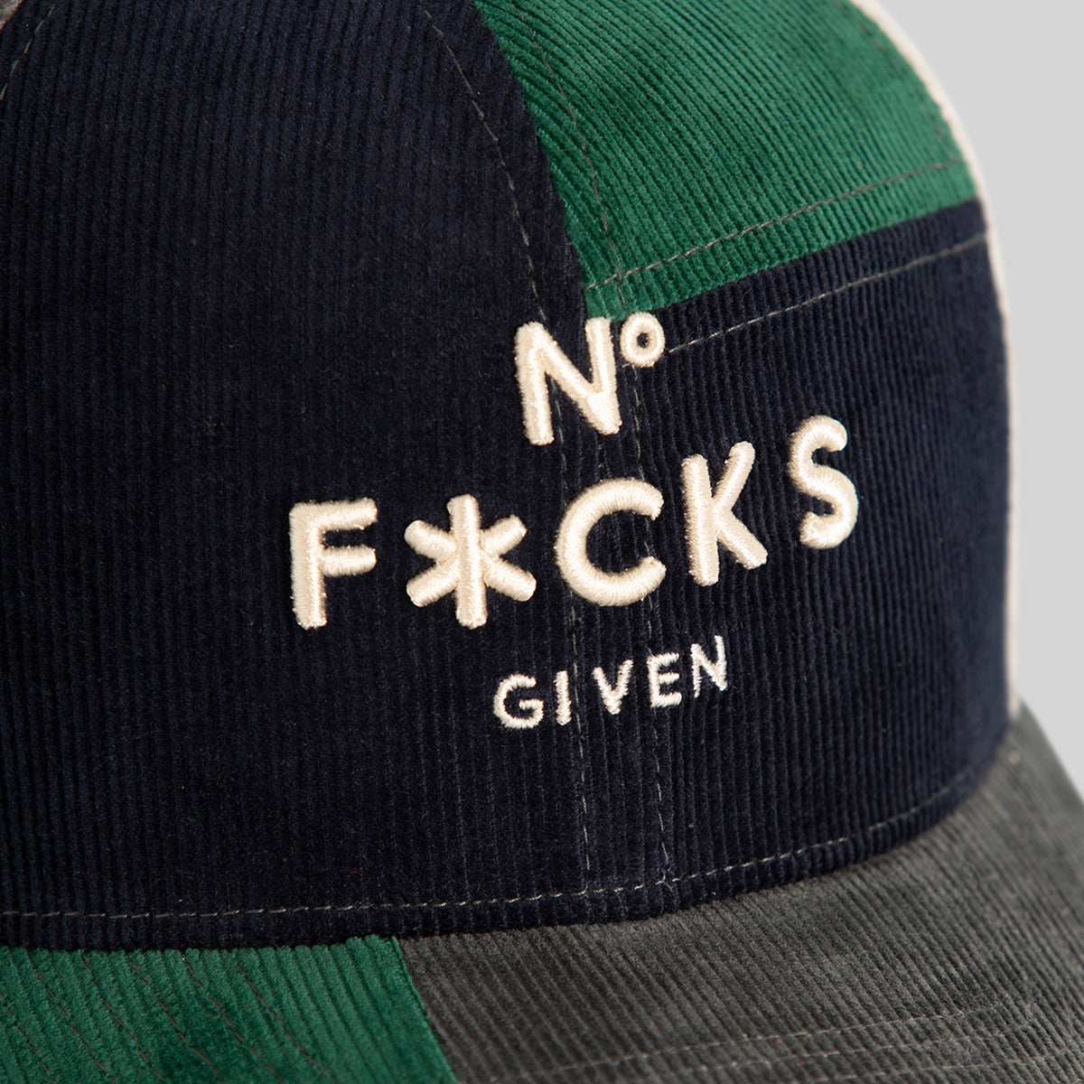 NO FUCKS GIVEN MULTI CORDUROY PATCHWORK TRUCKER