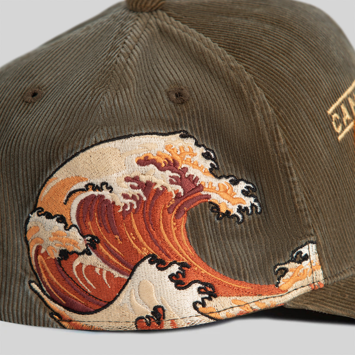 CAN'T STOP THE WAVE WASHED CORDUROY OLIVE TRUCKER