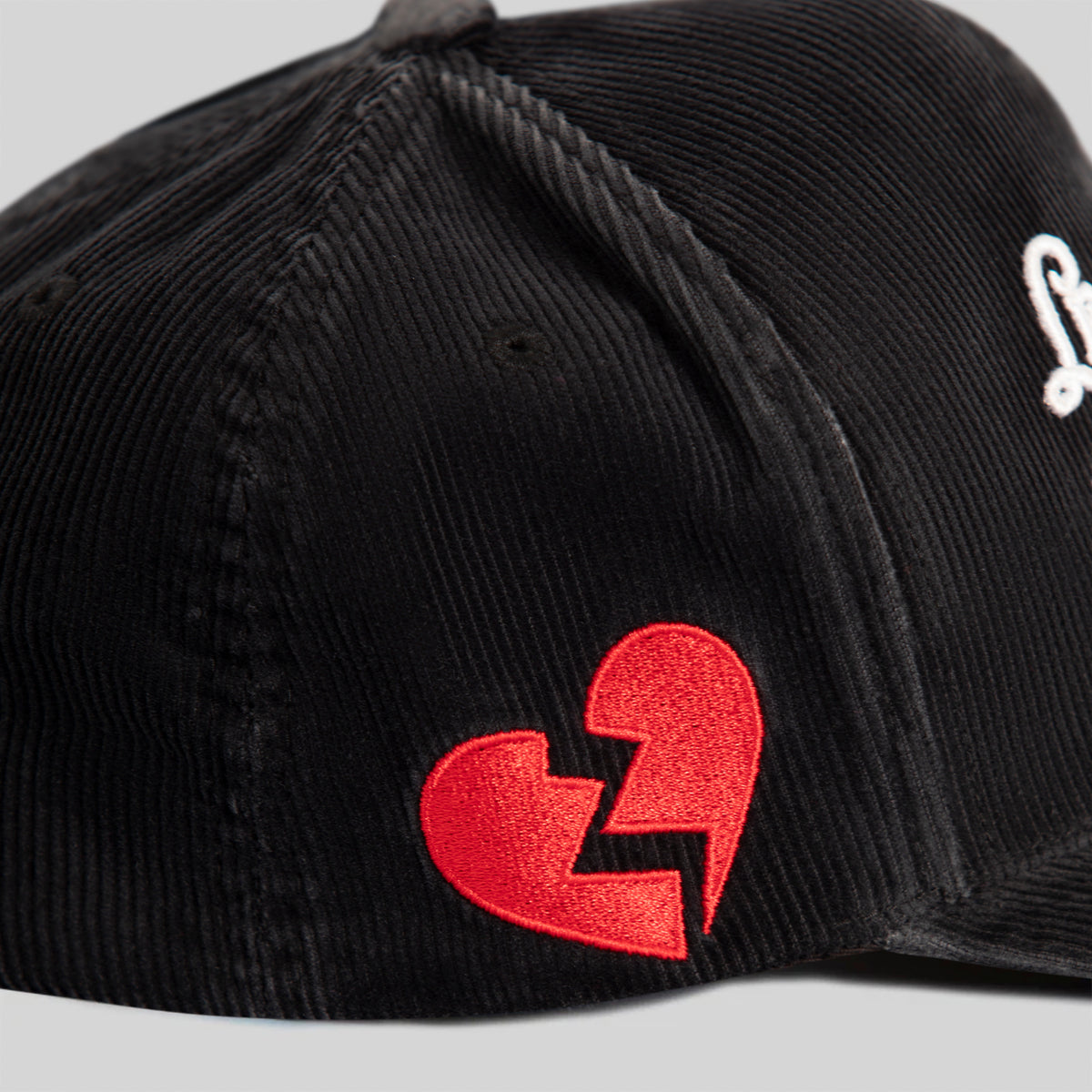 LEAVE YOUR FEELINGS WASHED CORDUROY BLACK TRUCKER