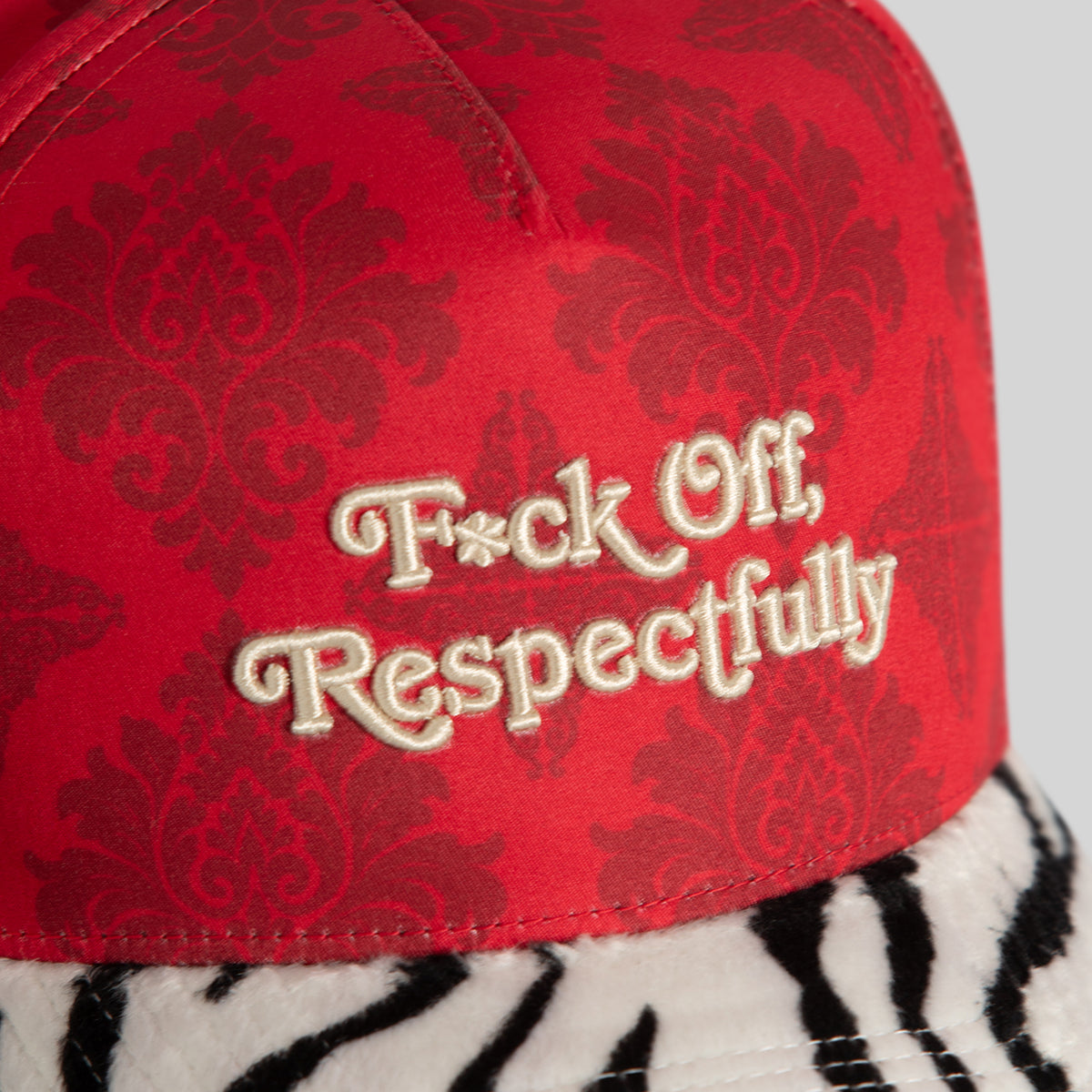 RESPECTFULLY JACQUARD FAUX ZEBRA TWILL TRUCKER