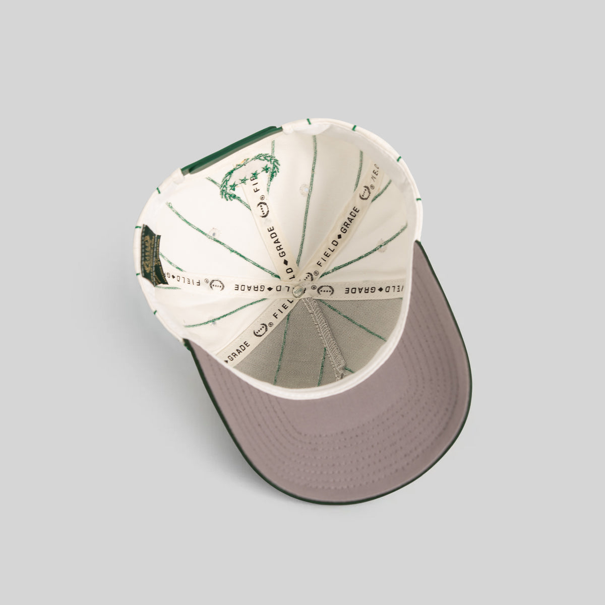 FIELD GRADE COLLEGIATE PINSTRIPE OFF WHITE EMERALD GREEN TWILL TRUCKER