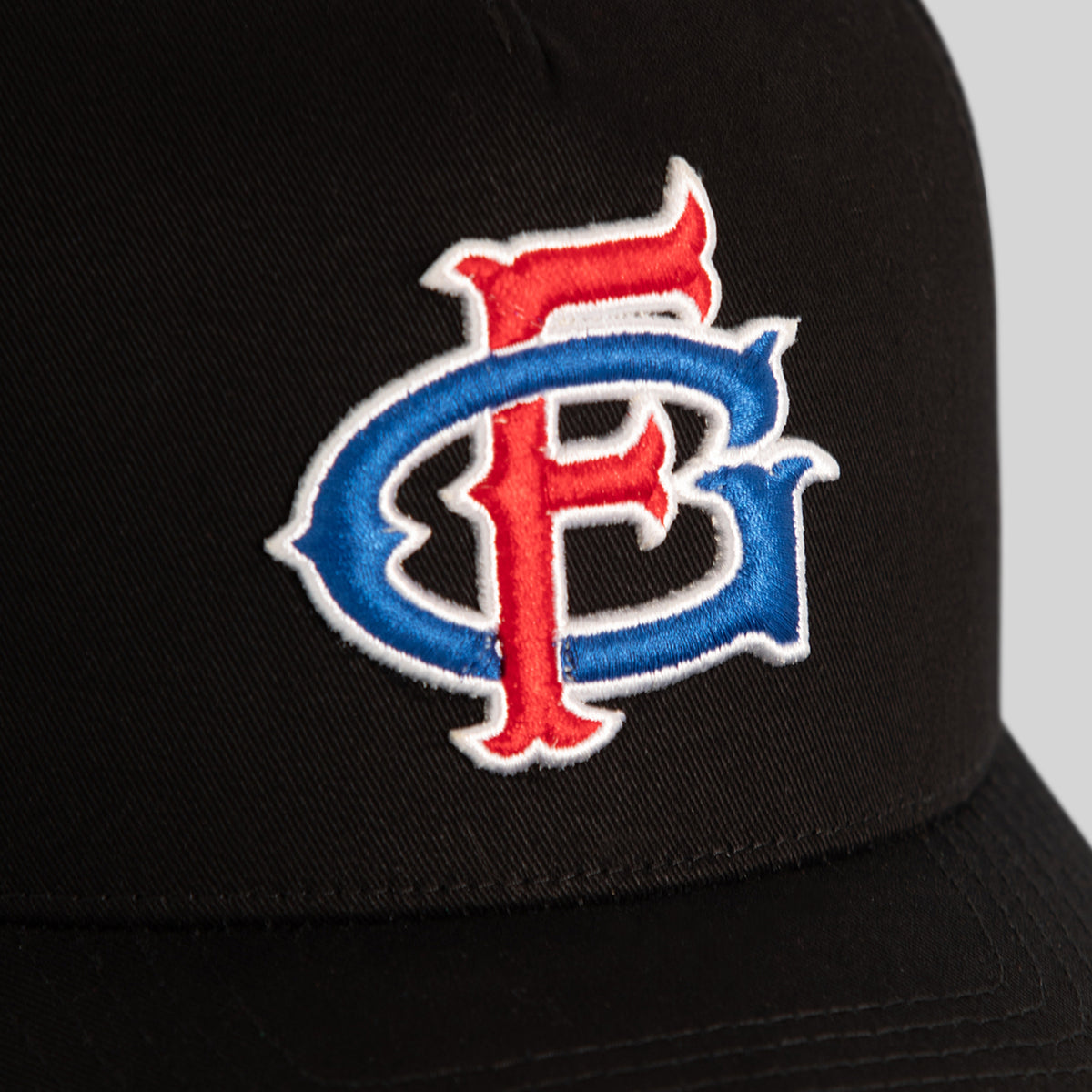 FIELD GRADE SPORTS BLACK TWILL MESH TRUCKER