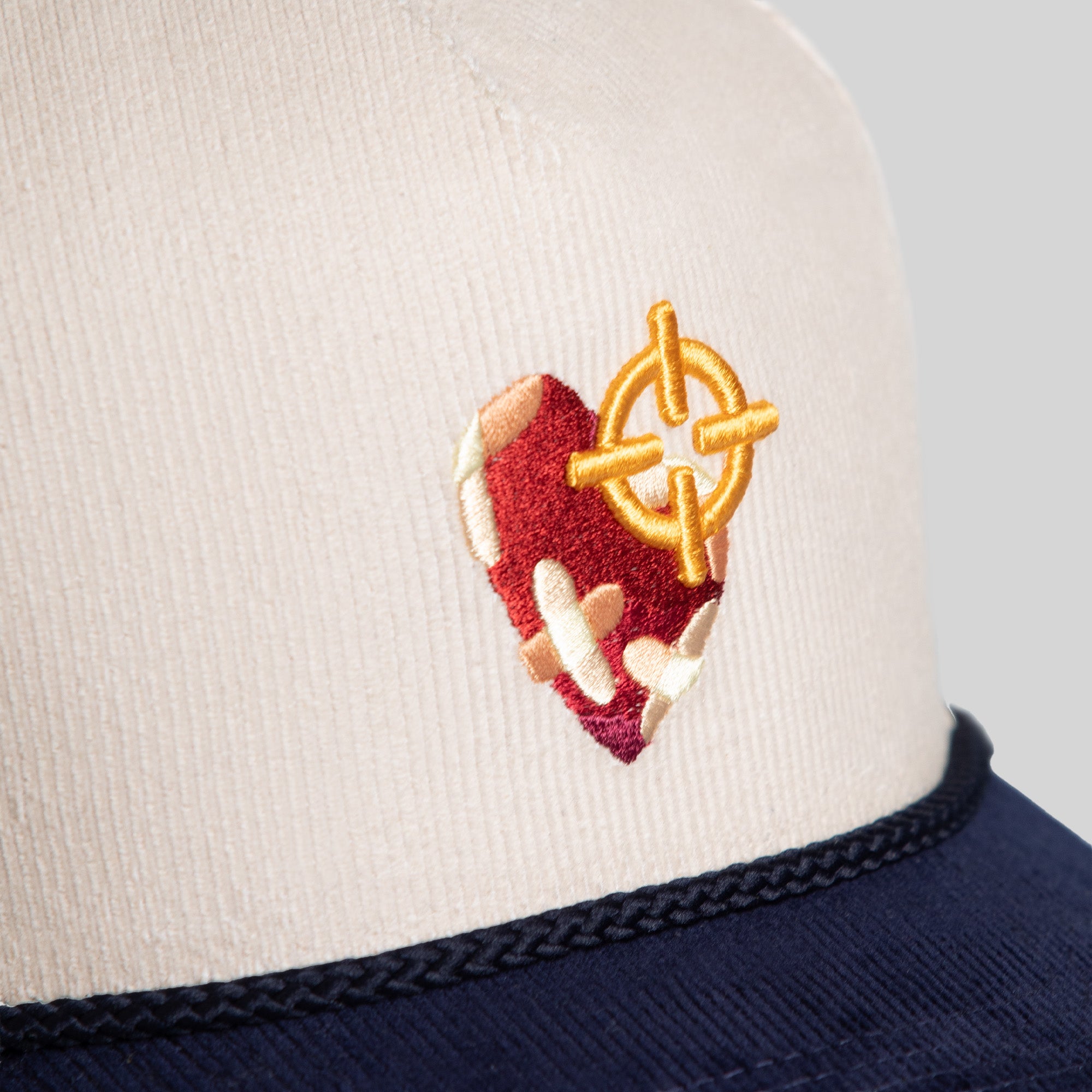 FIELD GRADE X KURVE STUDIO NY IS HEALING STONE/NAVY TRUCKER HAT