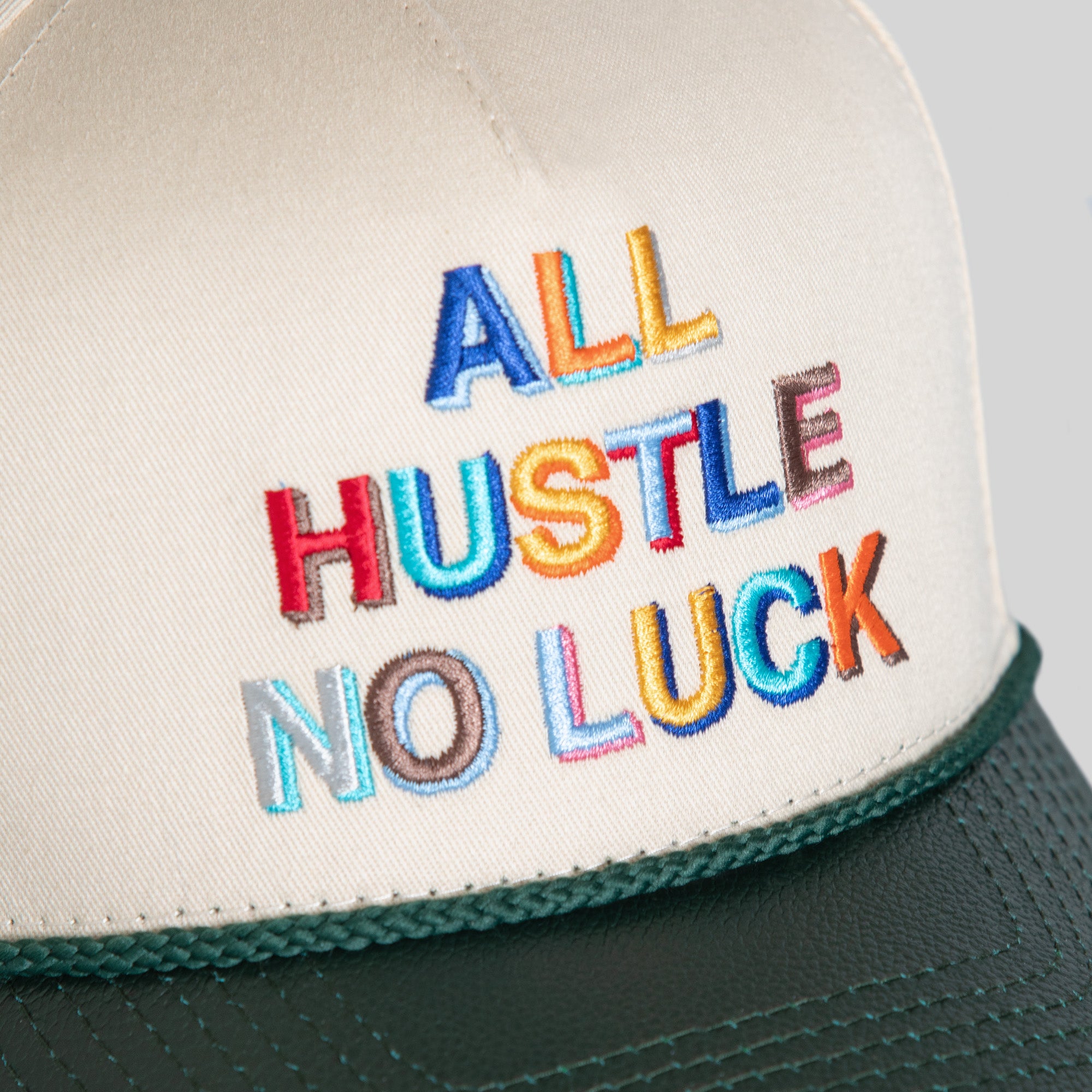 ALL HUSTLE NO LUCK SAND FG GREEN TWILL CAVIAR LEATHER TRUCKER