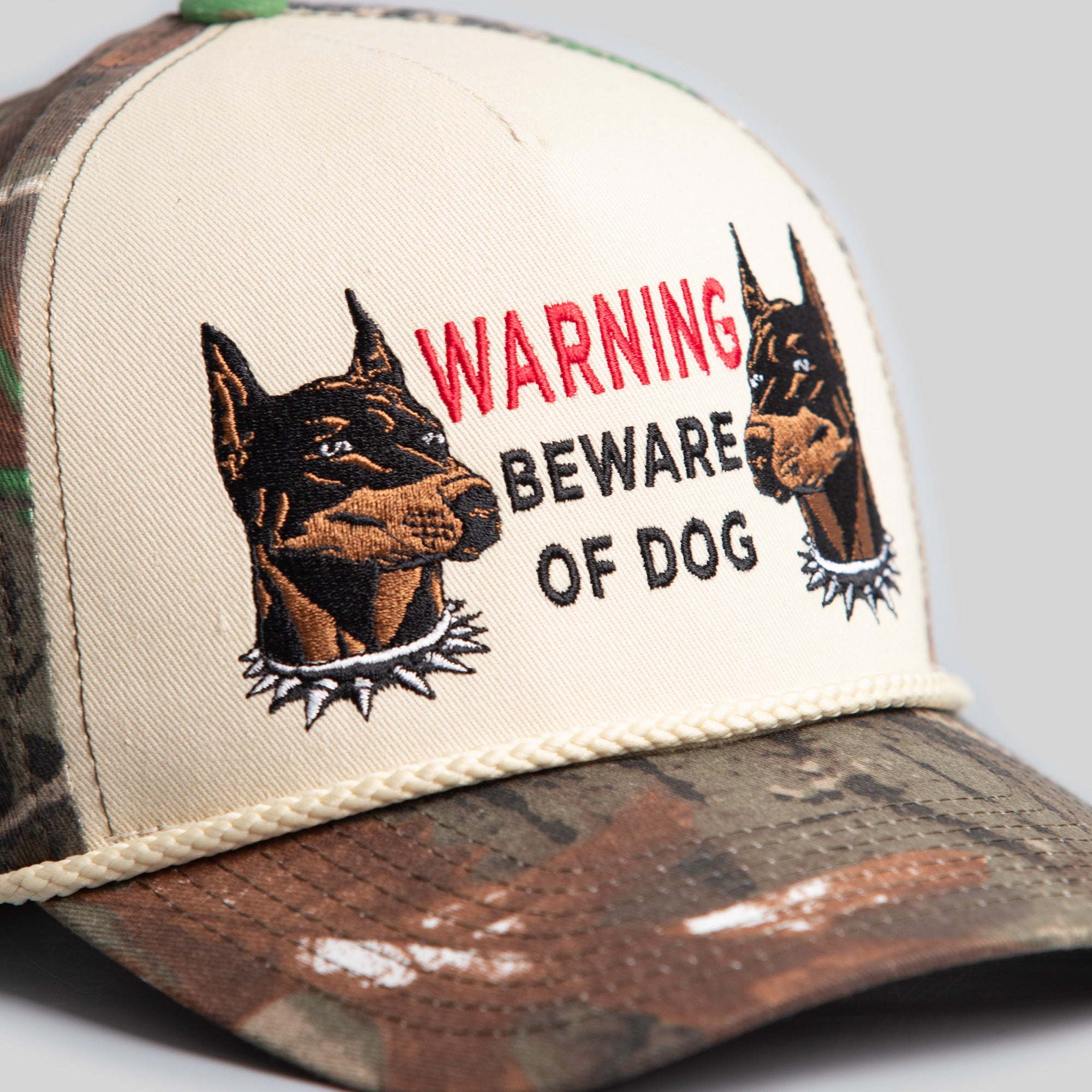 BEWARE OF DOG SAND/CAMO TRUCKER HAT