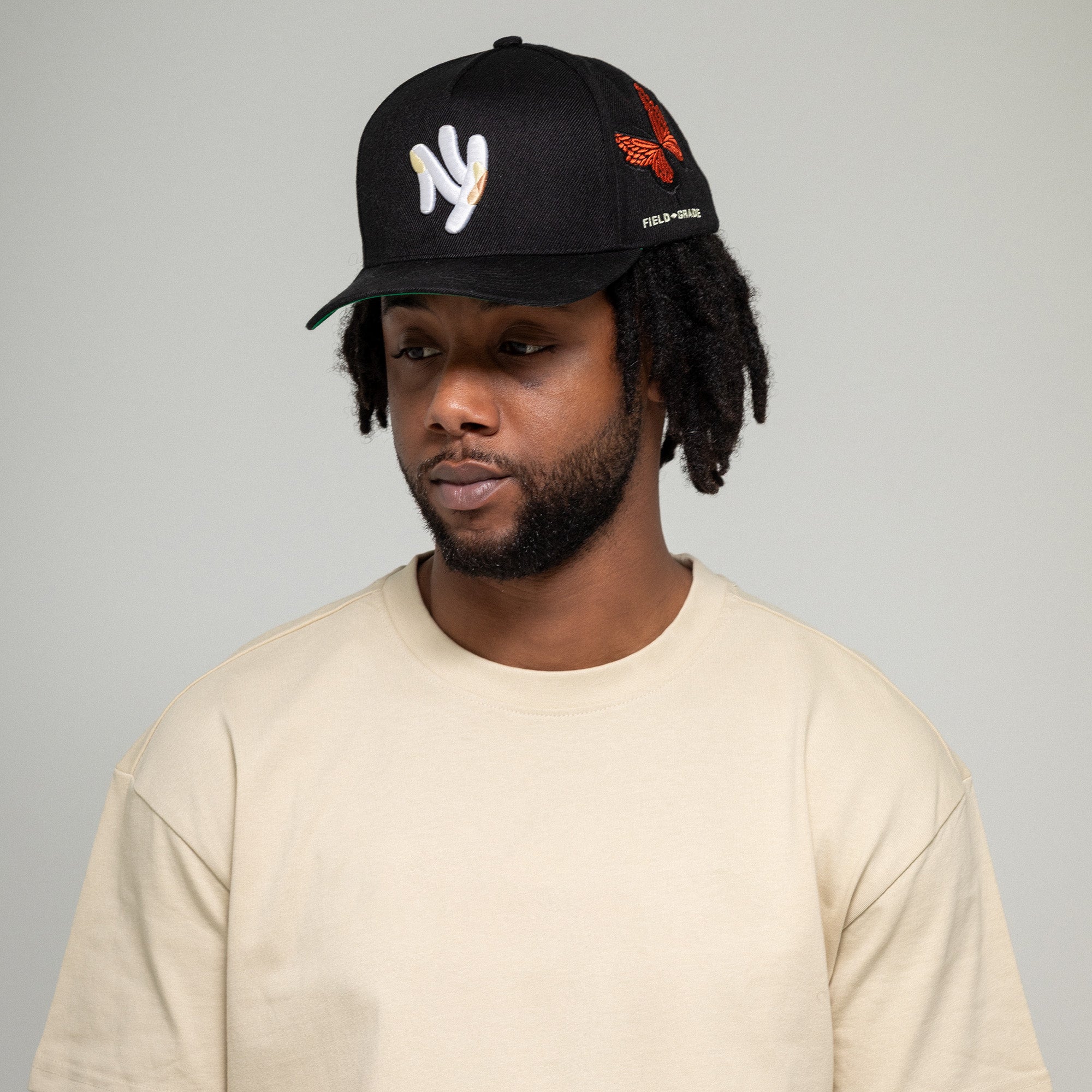 FIELD GRADE X KURVE STUDIO NY IS HEALING BUTTERFLIGHT WOOL TRUCKER