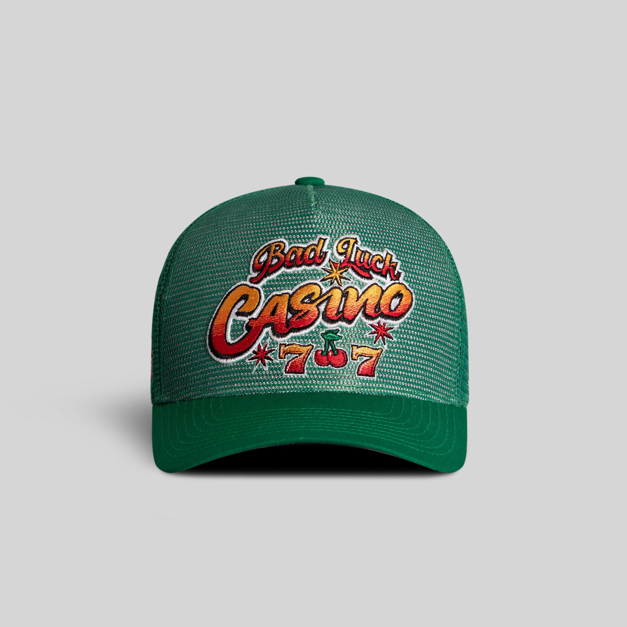 BAD LUCK CASINO GREEN MESH CROWN TRUCKER