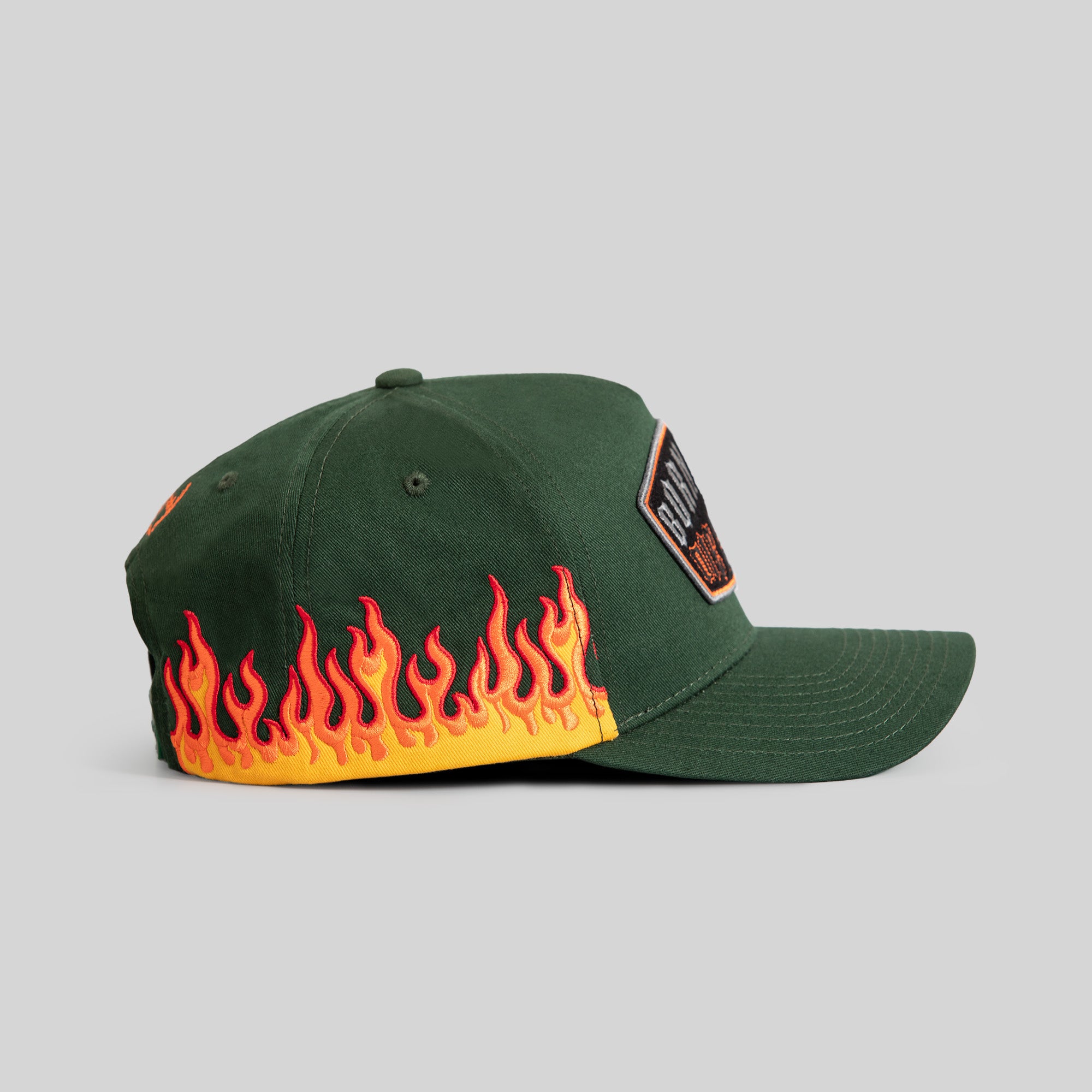 BORN ALONE FLAMES FG GREEN TWILL TRUCKER