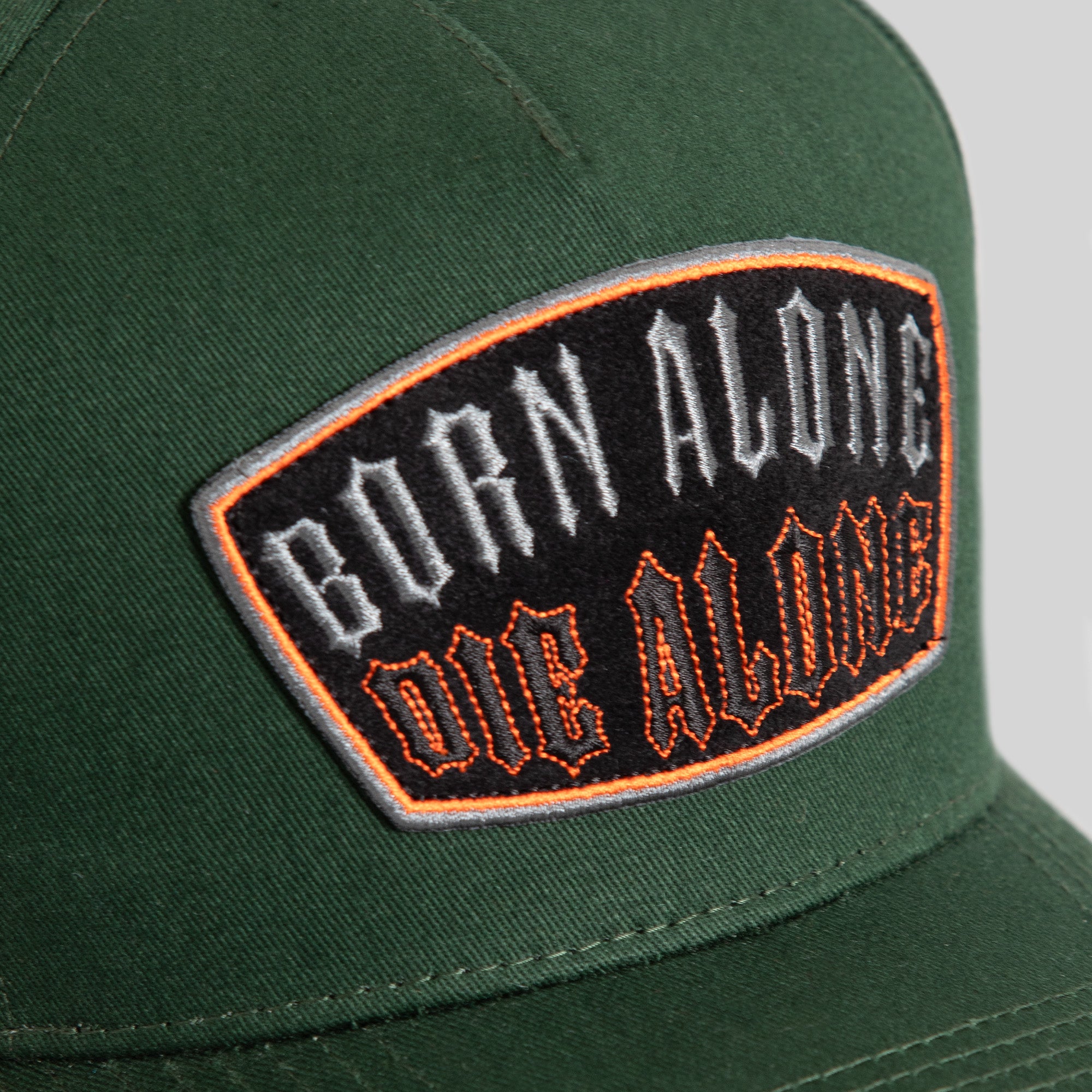 BORN ALONE FLAMES FG GREEN TWILL TRUCKER