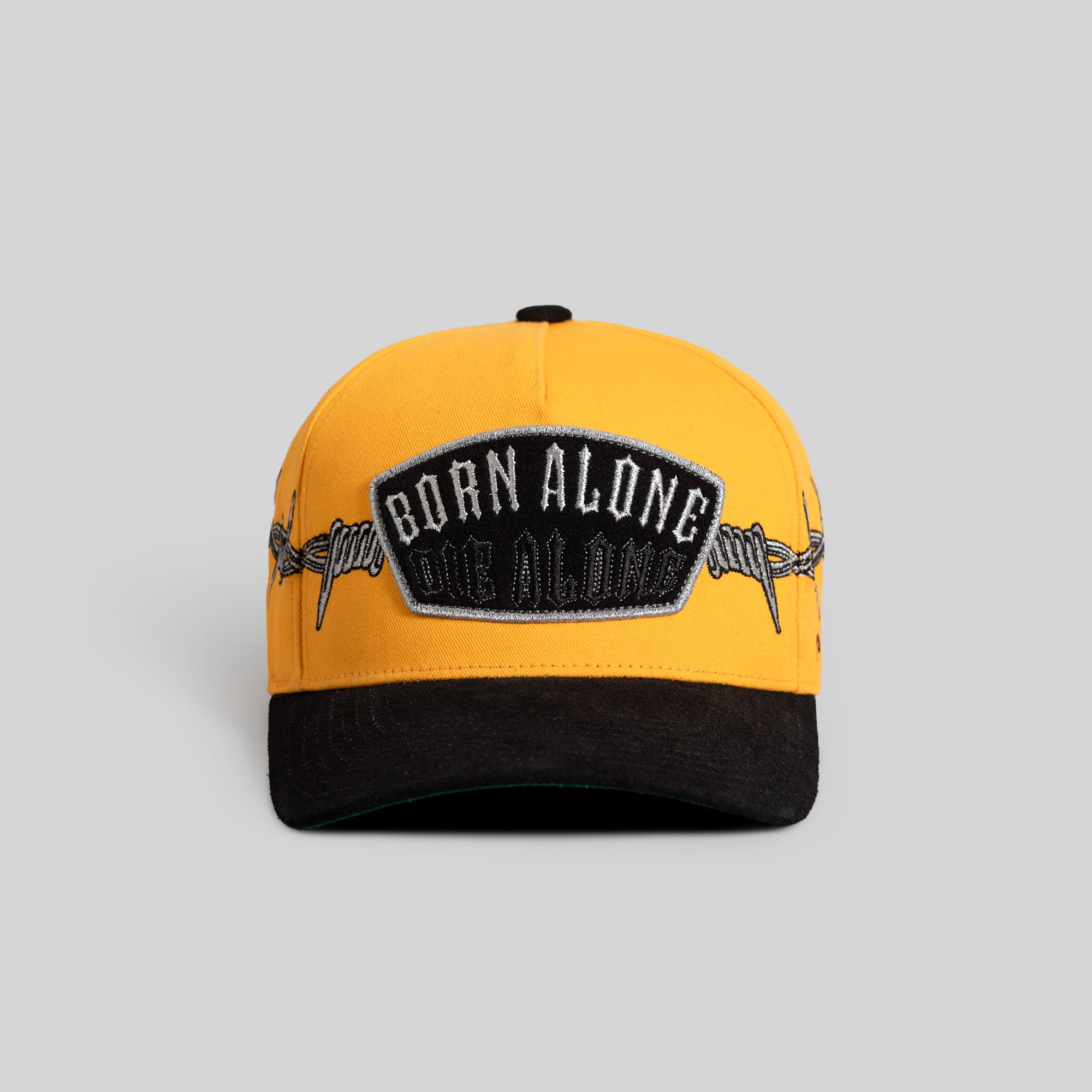 BORN ALONE BARBED WIRE GOLD BLACK TWILL SUEDE TRUCKER