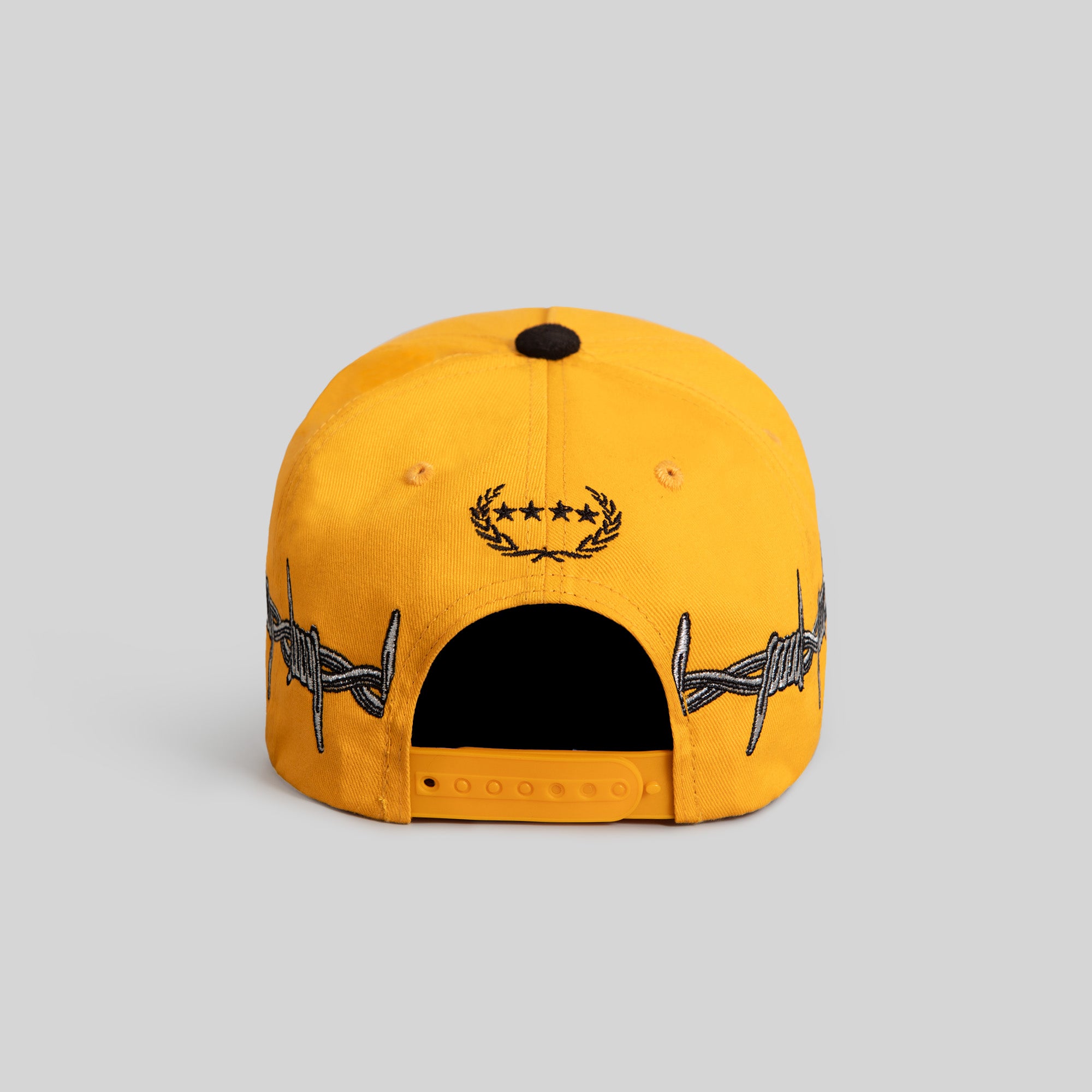 BORN ALONE BARBED WIRE GOLD BLACK TWILL SUEDE TRUCKER