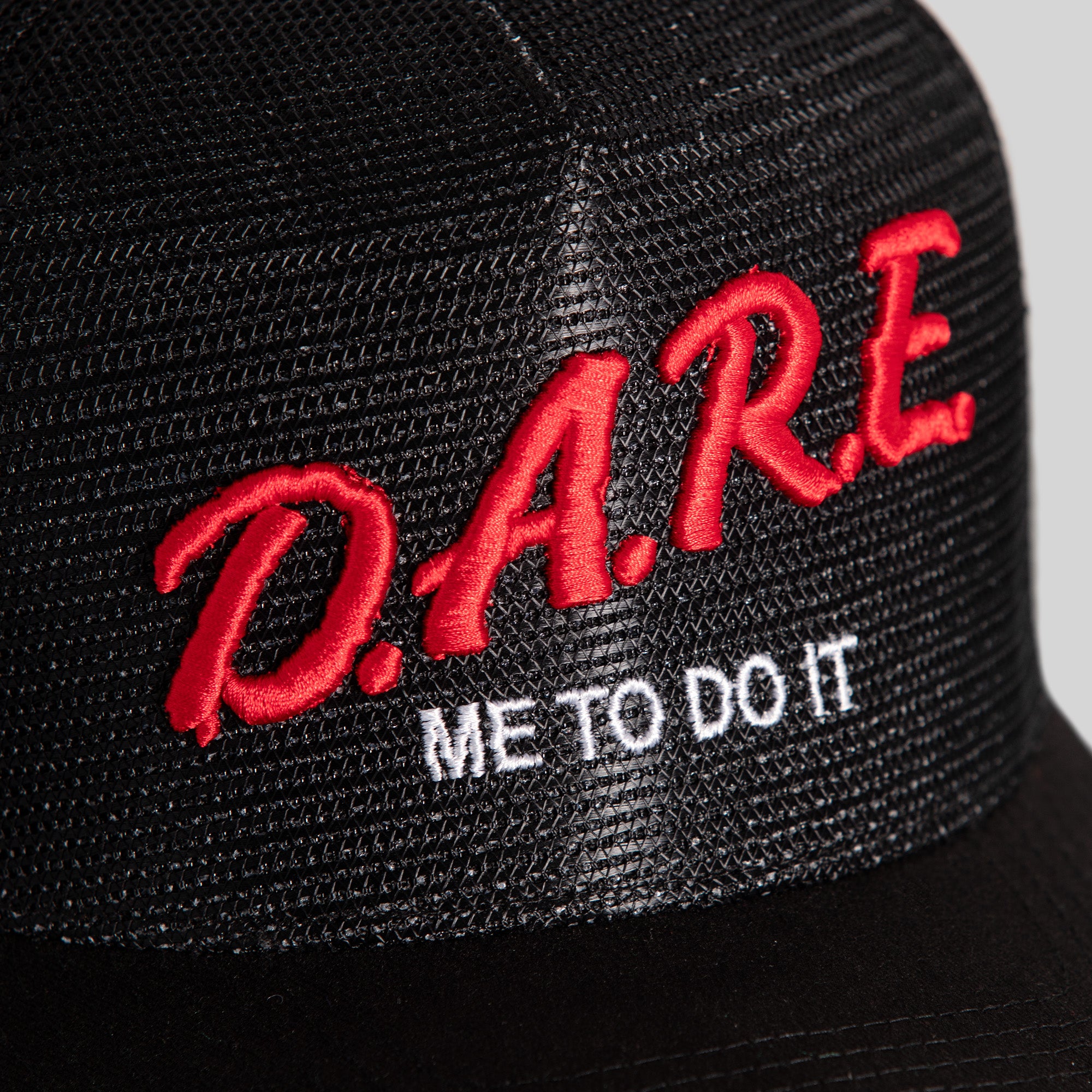 DARE ME TO DO IT BLACK MESH CROWN TRUCKER