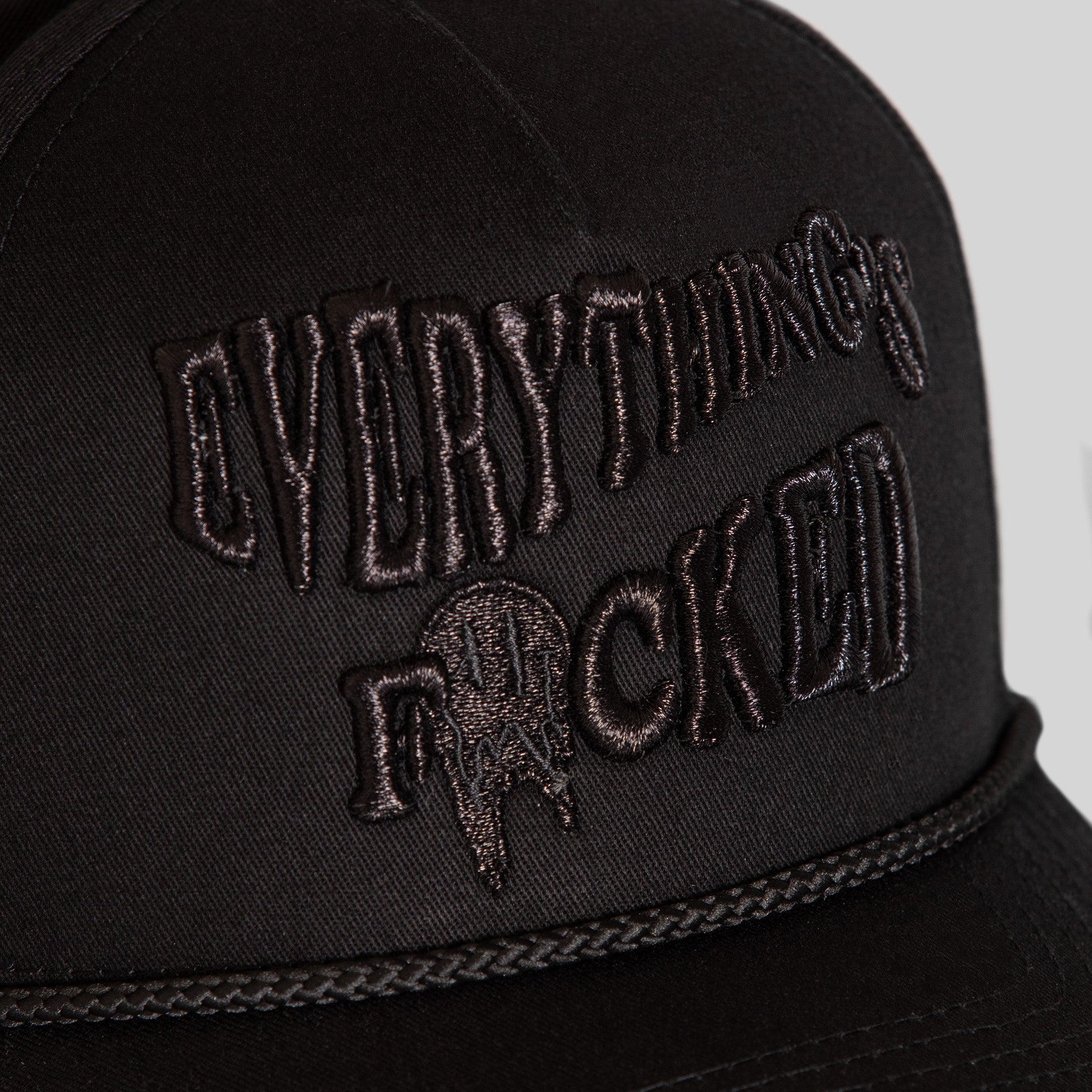 EVERYTHINGS F*CKED TRIPLE BLACK TWILL TRUCKER HAT