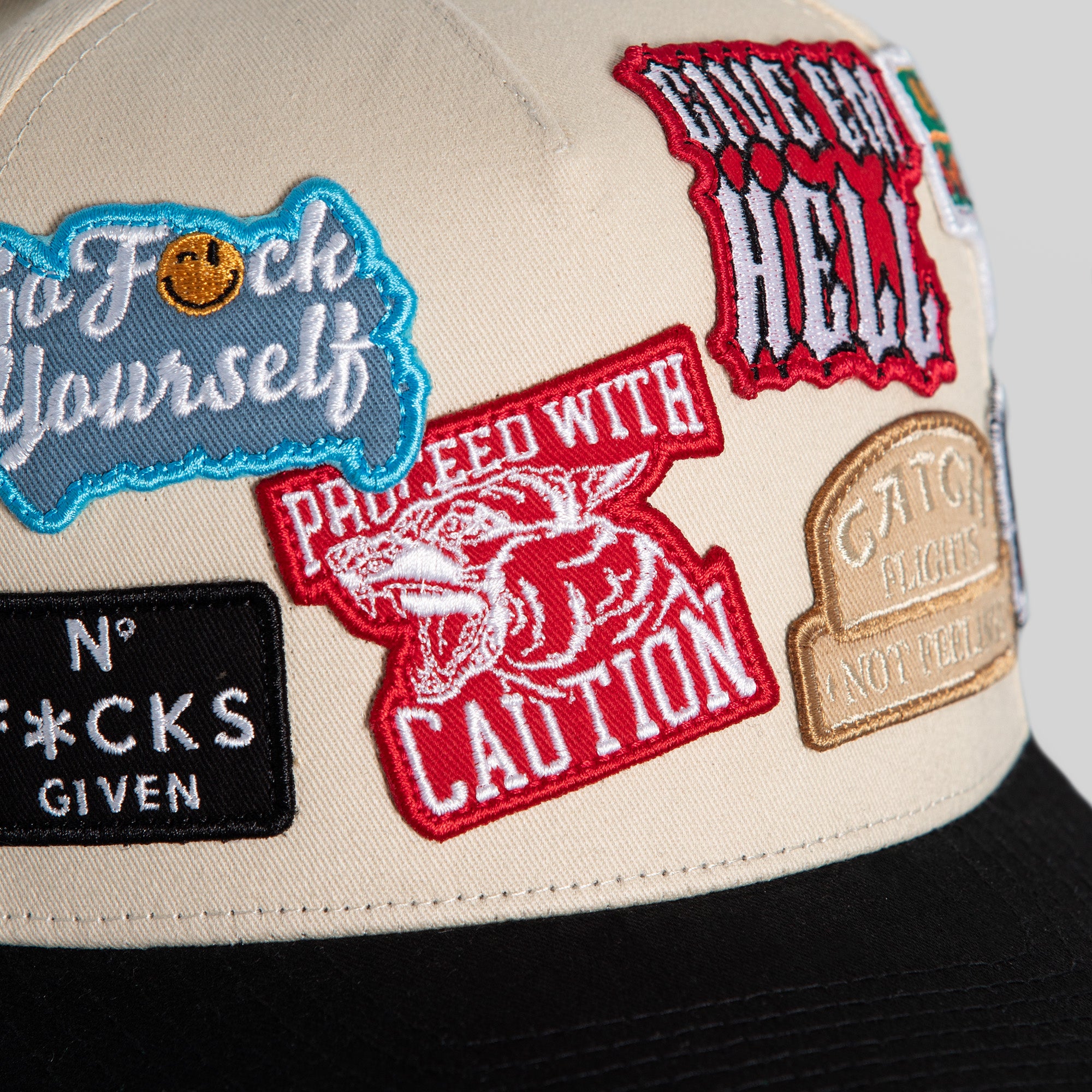 FIELD GRADE LOGOS PATCHWORK SAND BLACK TWILL TRUCKER