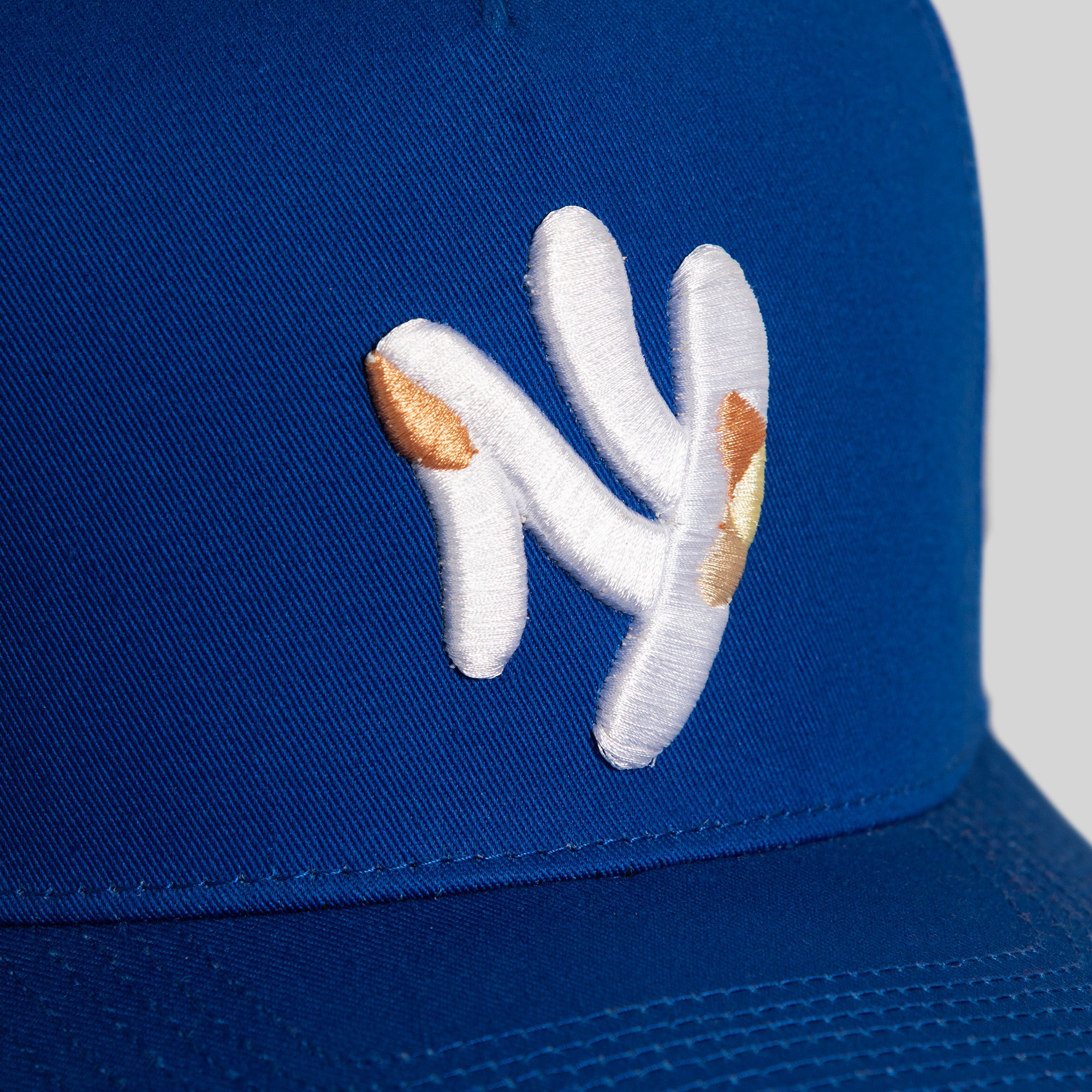 FIELD GRADE X KURVE STUDIO NY IS HEALING ROYAL TWILL TRUCKER