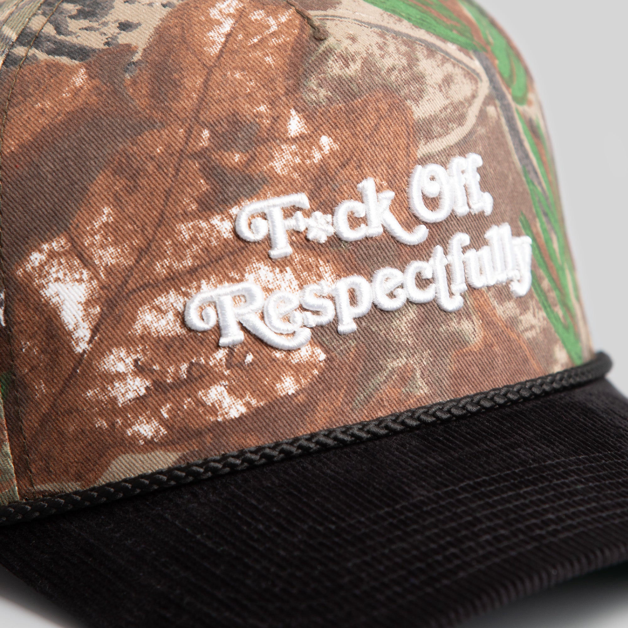 RESPECTFULLY CAMO/BLACK TRUCKER HAT