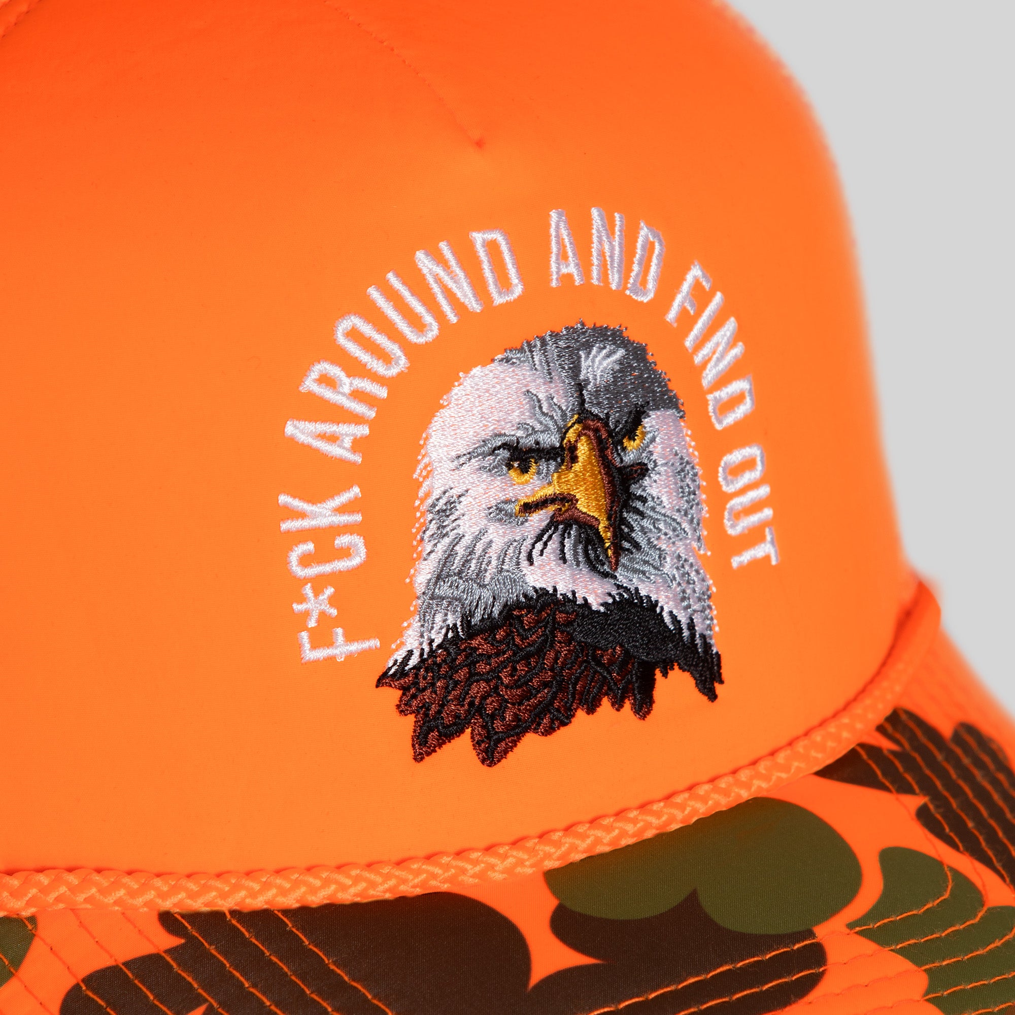 F*CK AROUND AND FIND OUT ORANGE DUCK CAMO FOAM TRUCKER