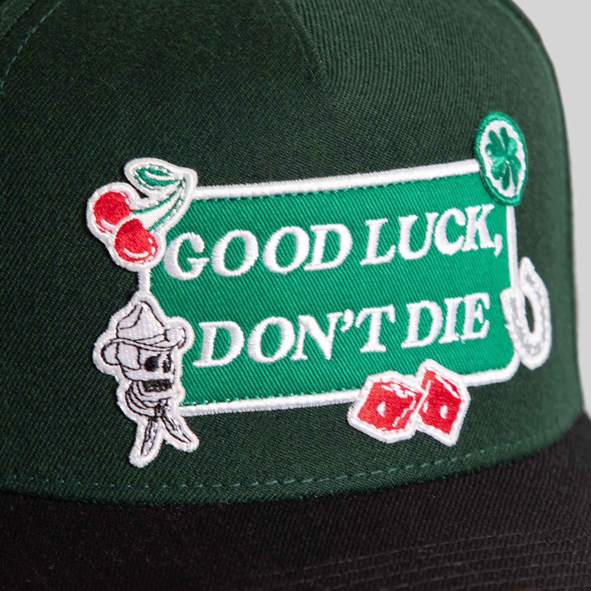 GOOD LUCK DON'T DIE EMERALD BLACK WOOL TRUCKER