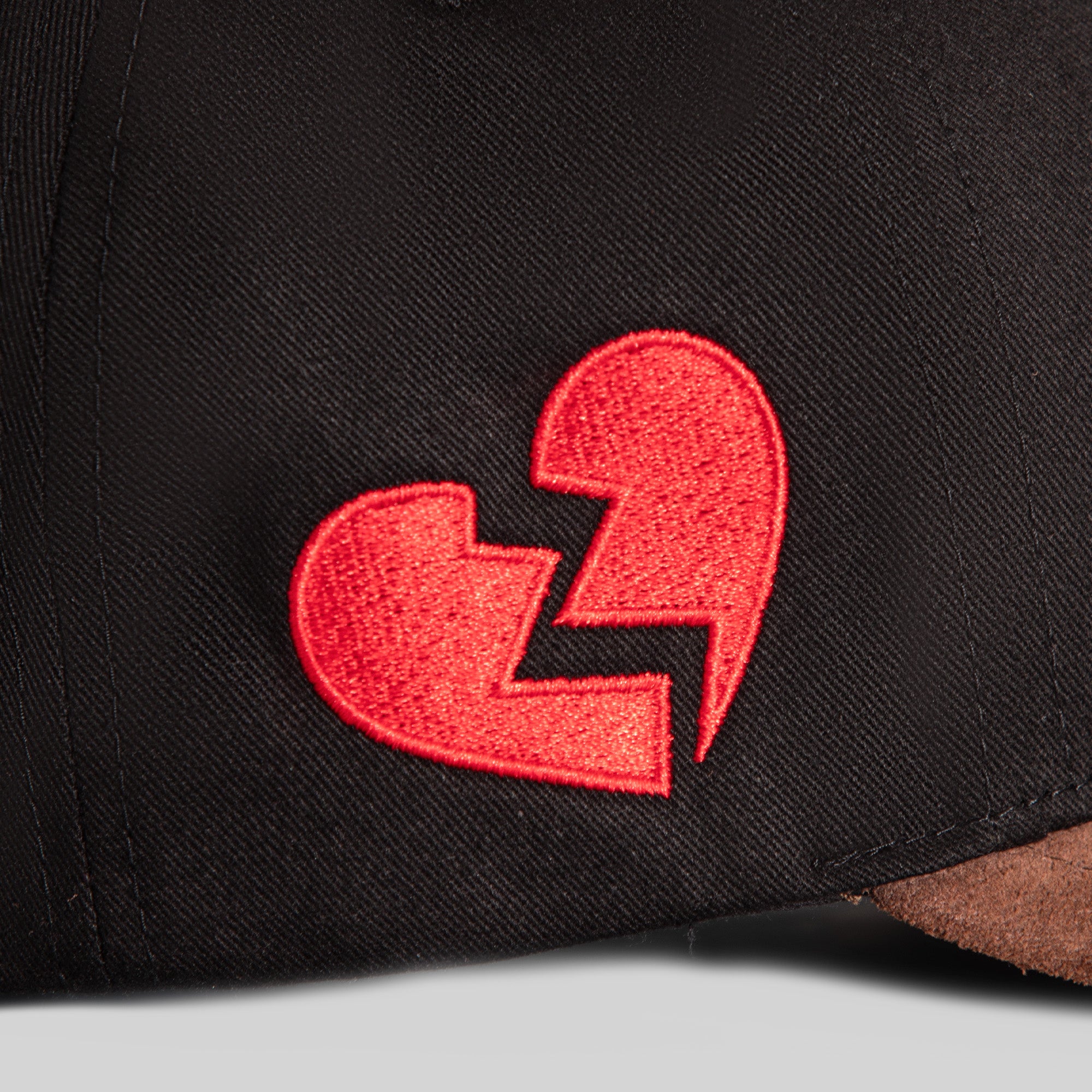 LEAVE YOUR FEELINGS BLACK MOCHA TWILL SUEDE TRUCKER