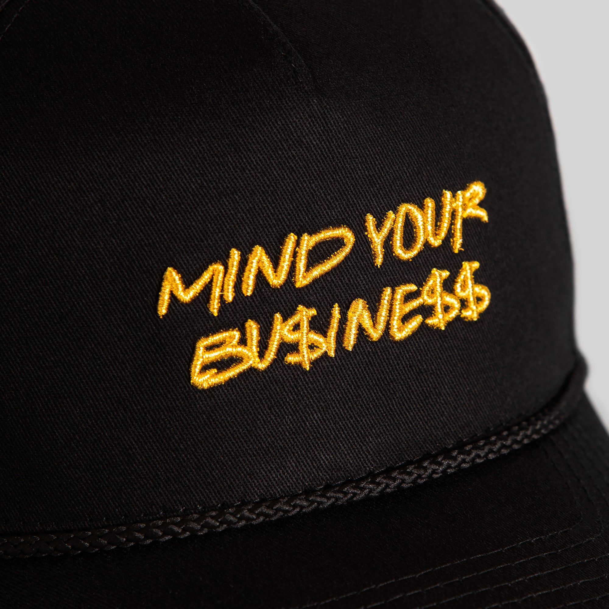 MIND YOUR BUSINESS BLACK TWILL TRUCKER