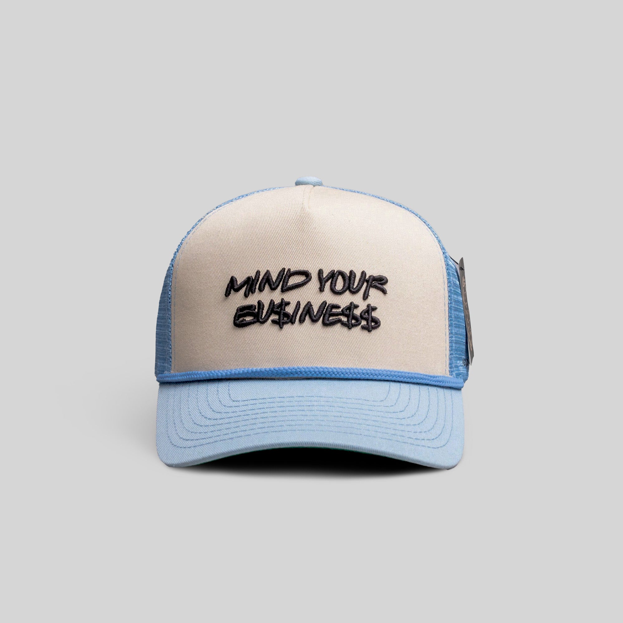 MIND YOUR BUSINESS SAND UNI BLUE TRUCKER HAT