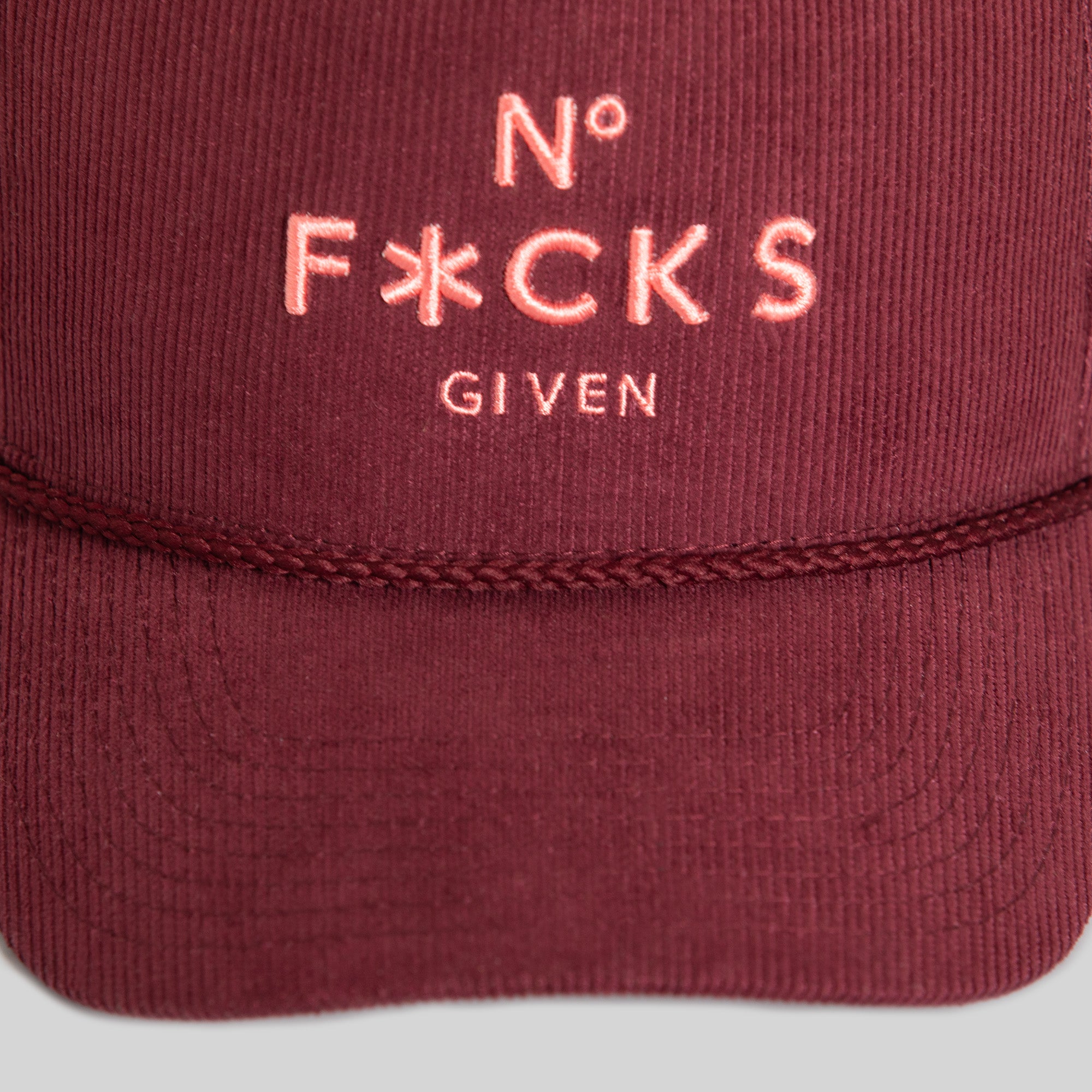 NO F*CKS GIVEN BORDEAUX PINK CORDUROY TRUCKER