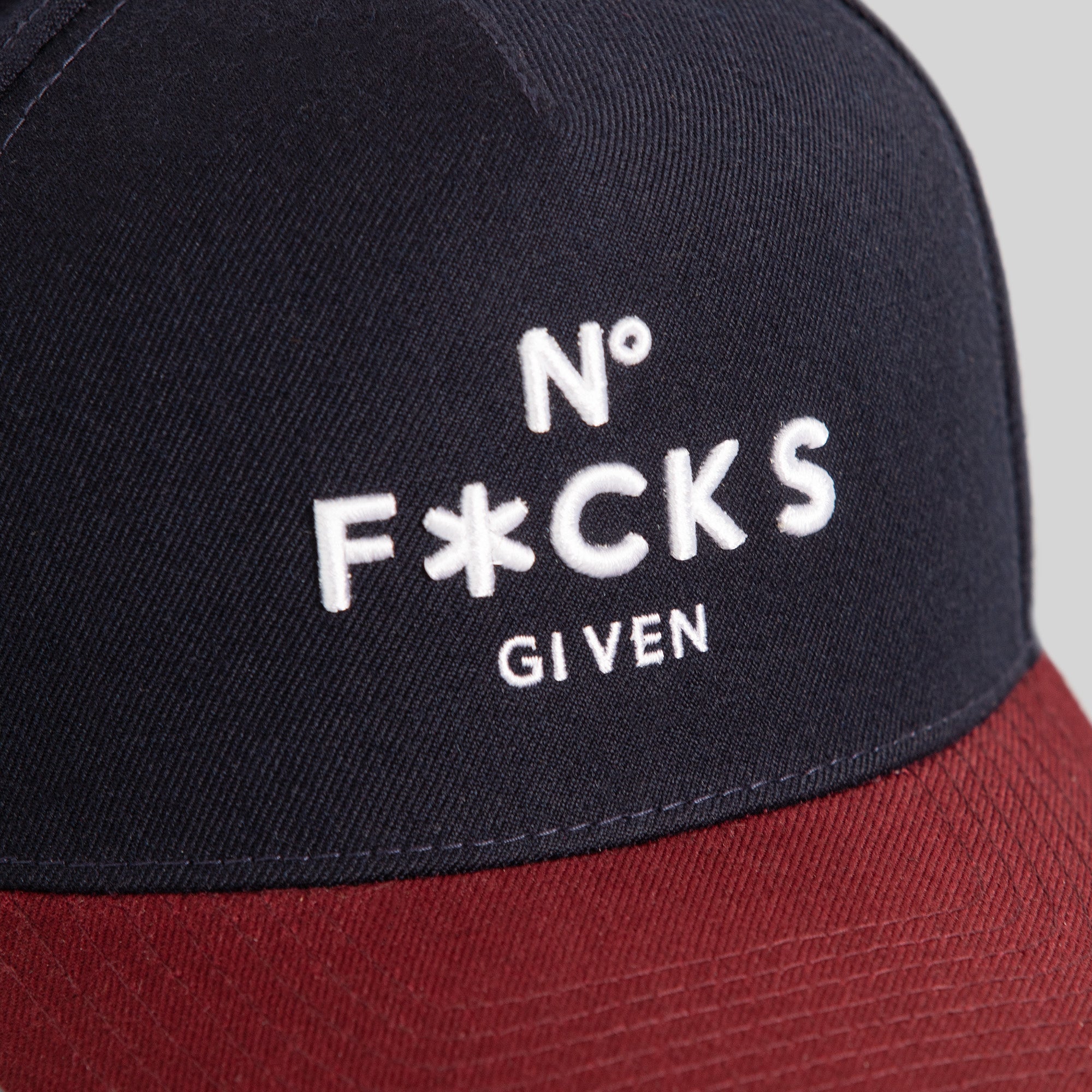 NO F*CKS GIVEN DEEP NAVY BORDEAUX TRUCKER HAT