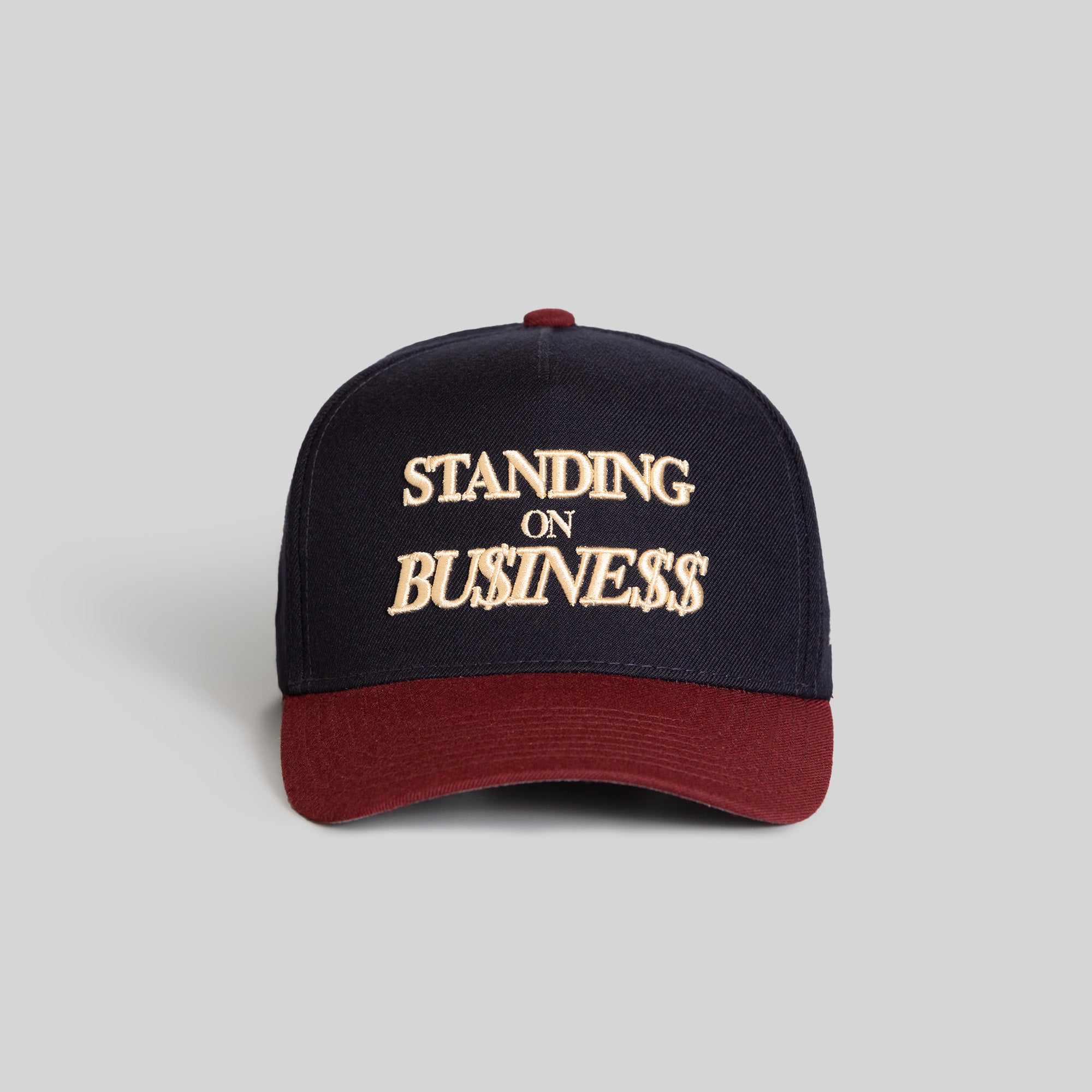 ON BUSINESS BORDEAUX DEEP NAVY TRUCKER HAT