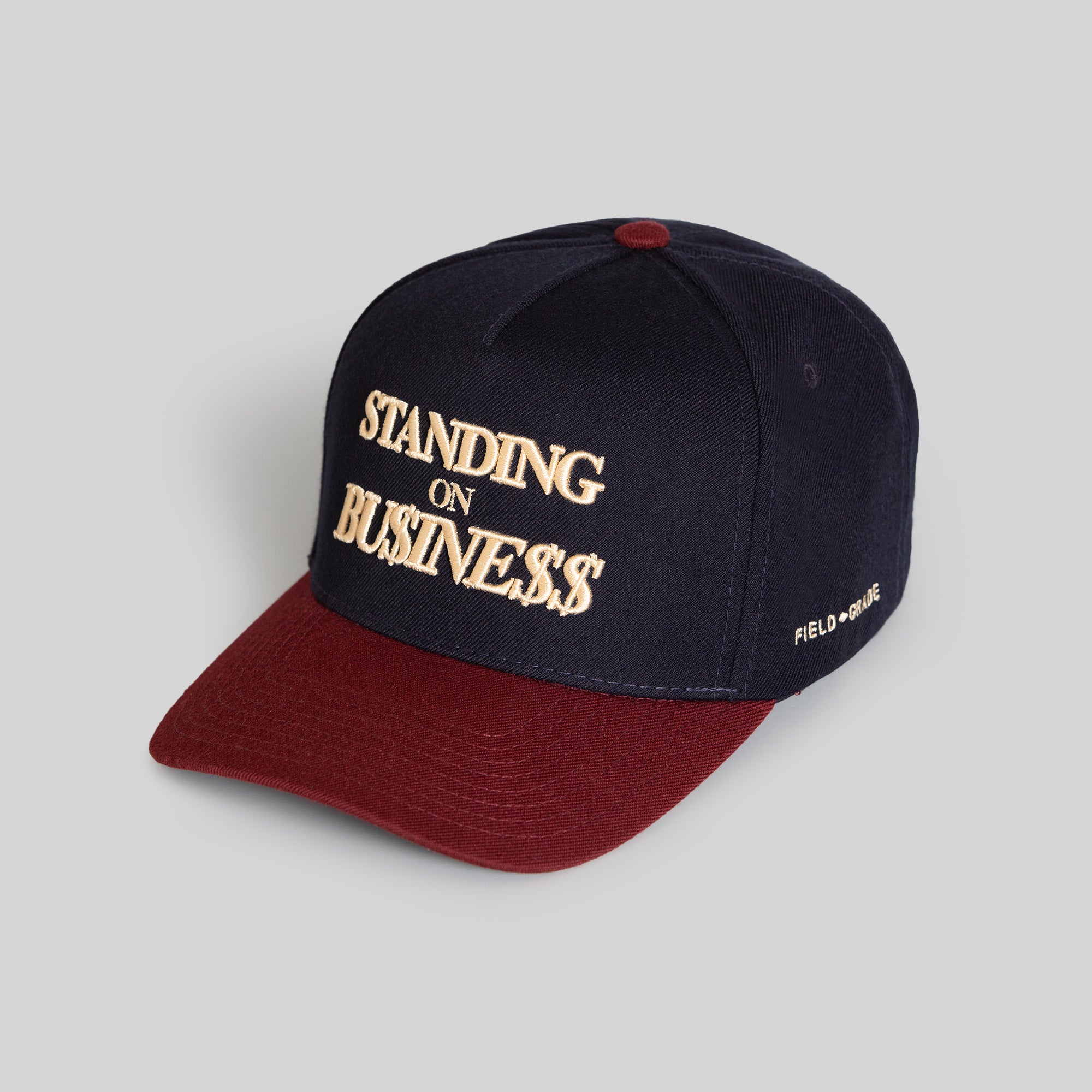 ON BUSINESS BORDEAUX DEEP NAVY WOOL TRUCKER HAT