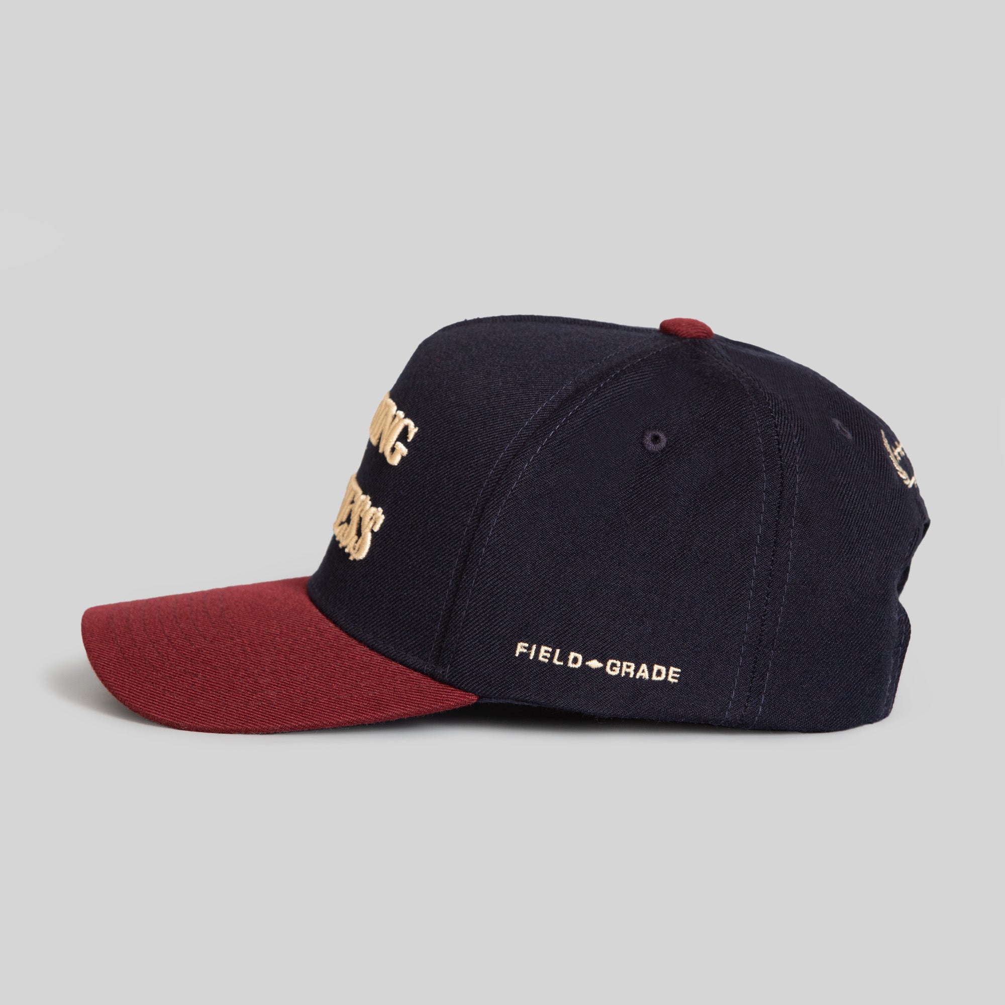 ON BUSINESS BORDEAUX DEEP NAVY WOOL TRUCKER HAT