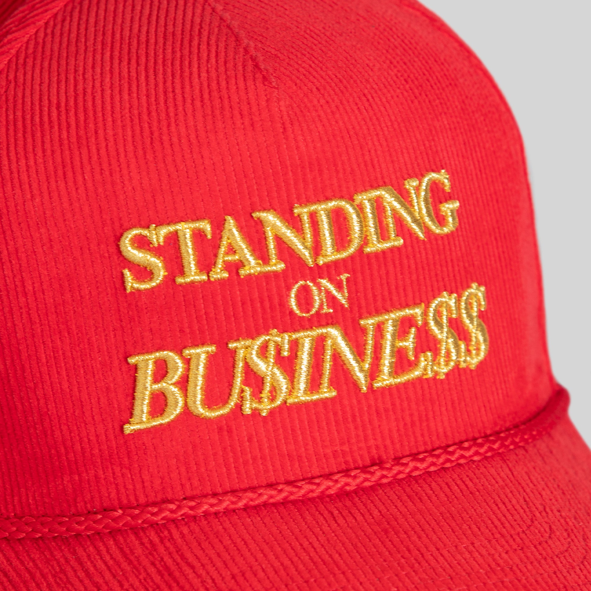 ON BUSINESS VARSITY RED CORDUROY TRUCKER