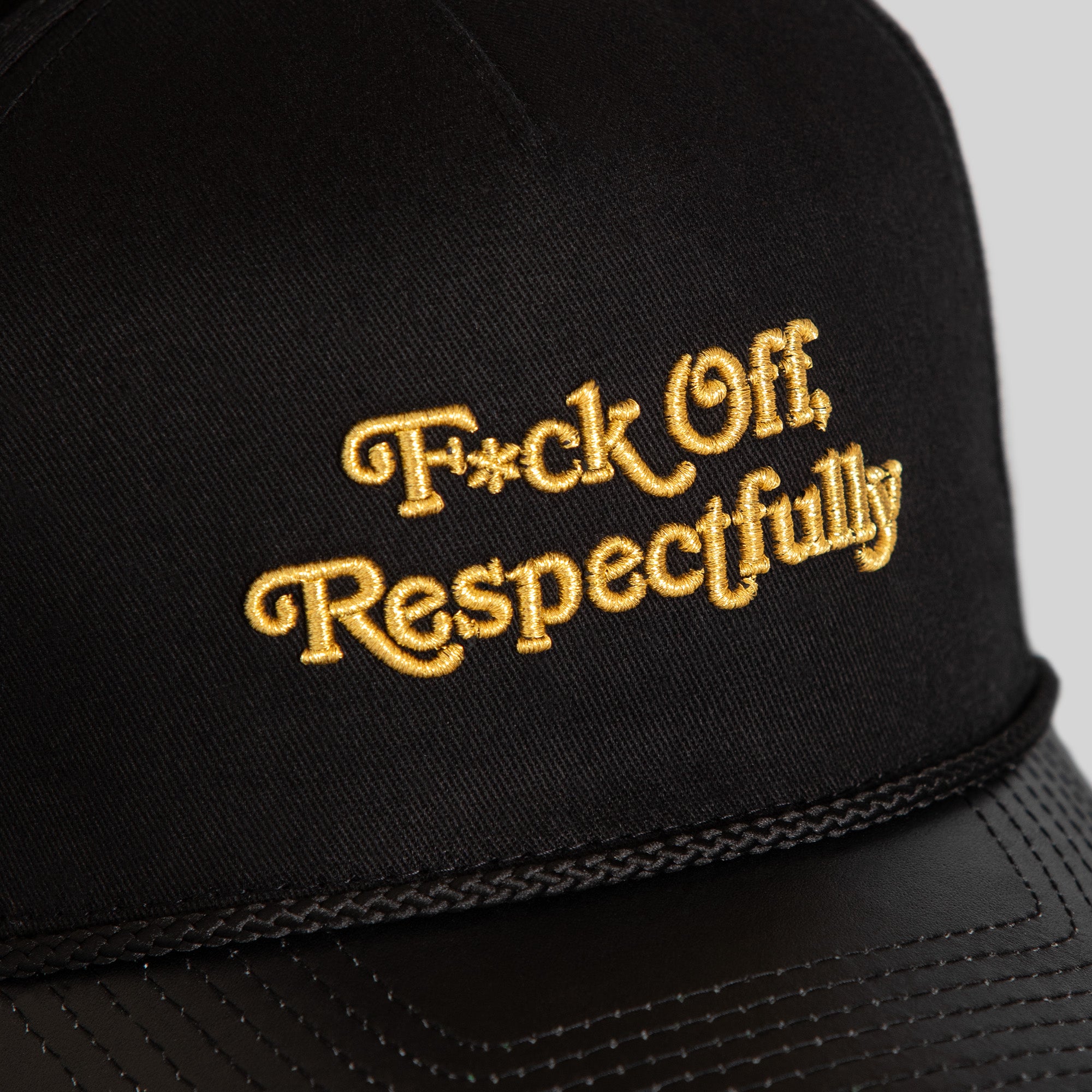 RESPECTFULLY BLACK TWILL NAPPA LEATHER TRUCKER