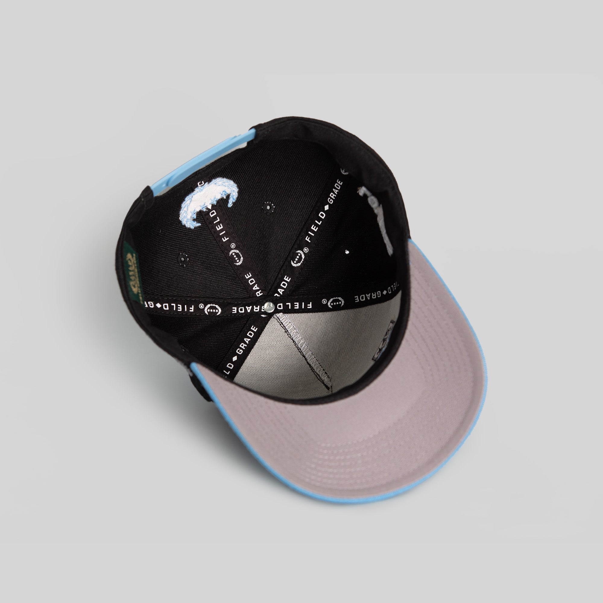 STAY CREATIVE BLACK UNI BLUE WOOL TRUCKER