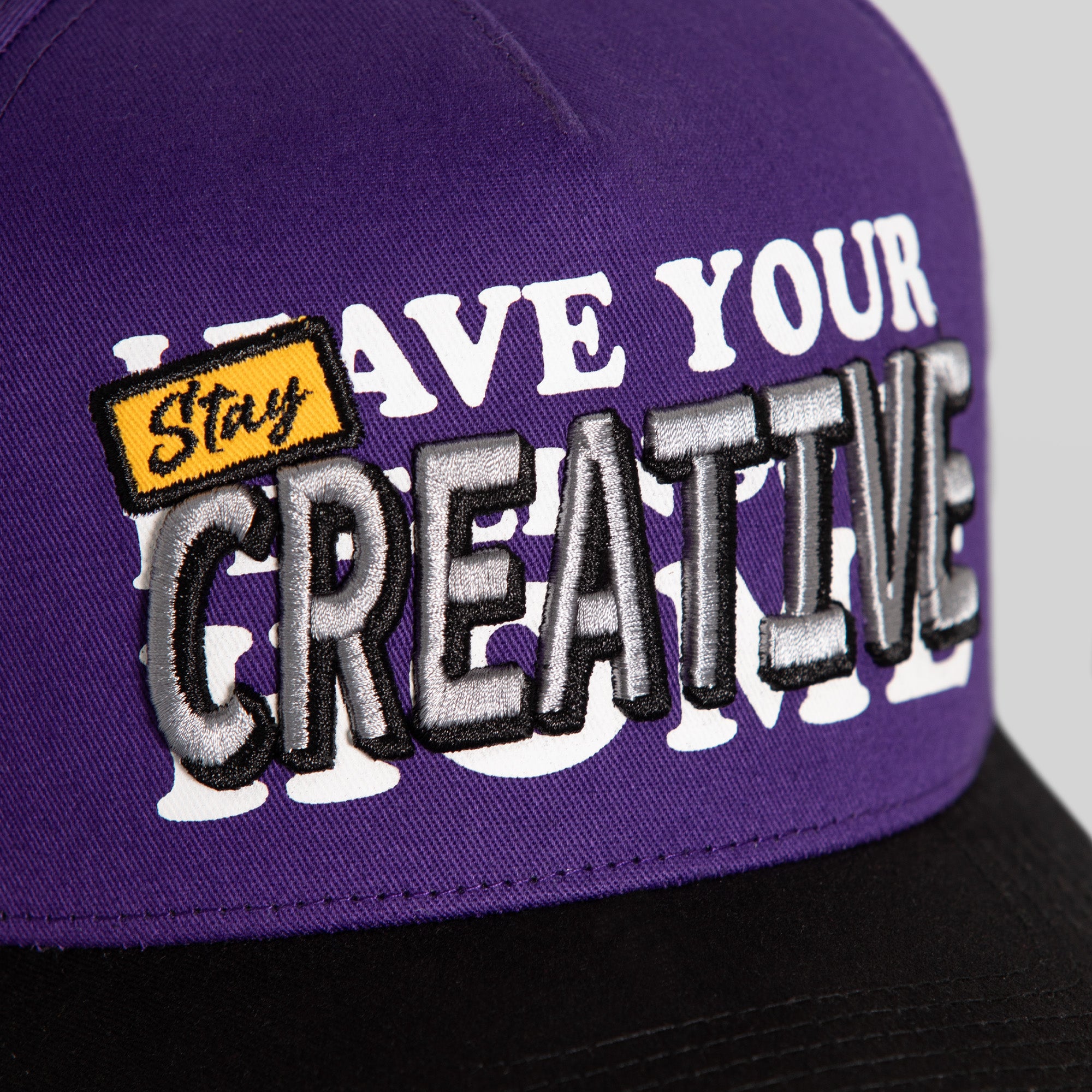 STAY CREATIVE PURPLE BLACK WOOL TRUCKER