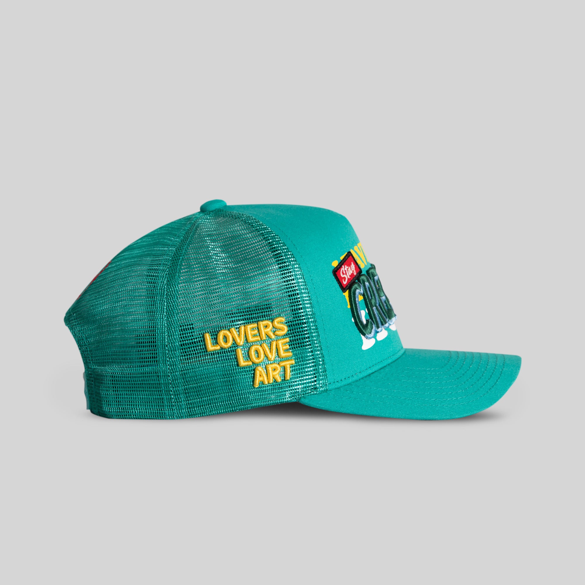 STAY CREATIVE TEAL TWILL MESH TRUCKER