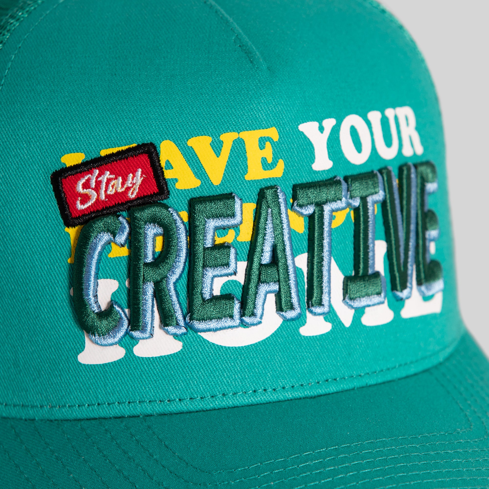 STAY CREATIVE TEAL TWILL MESH TRUCKER
