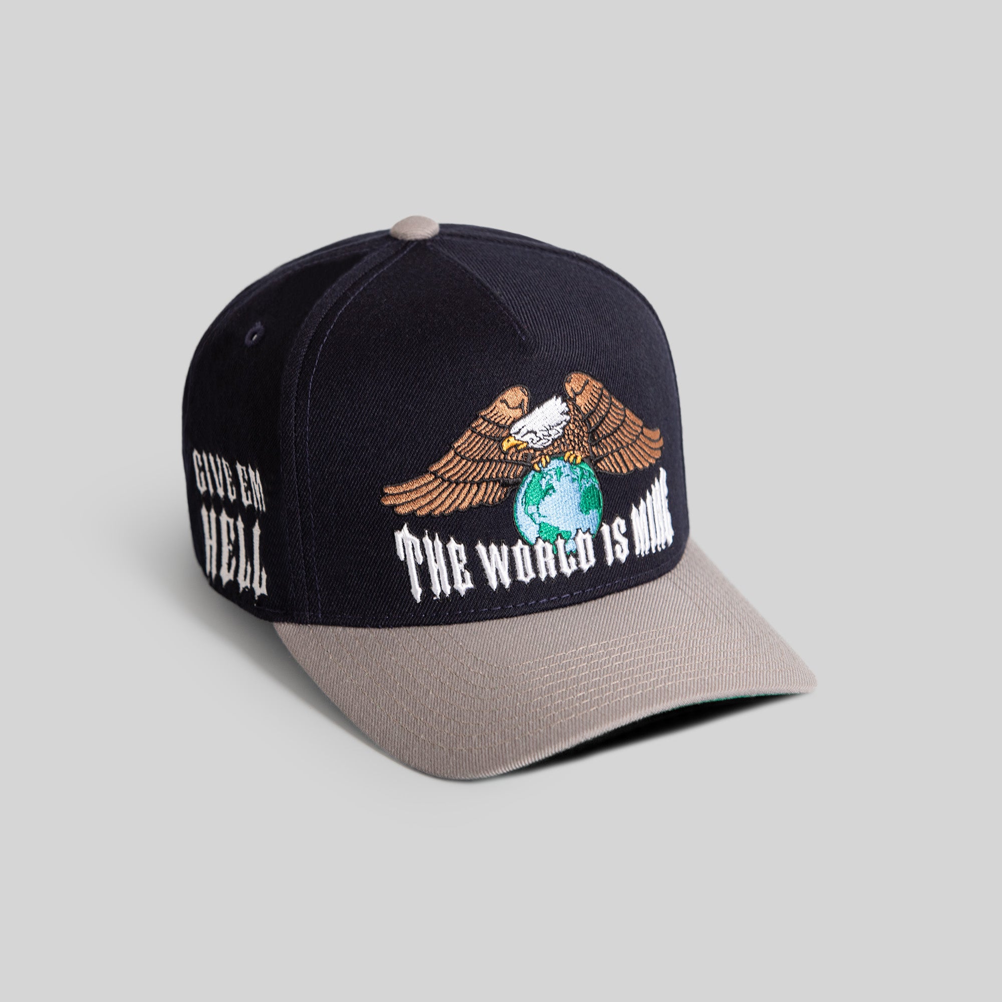 THE WORLD IS MINE DEEP NAVY CEMENT WOOL TRUCKER