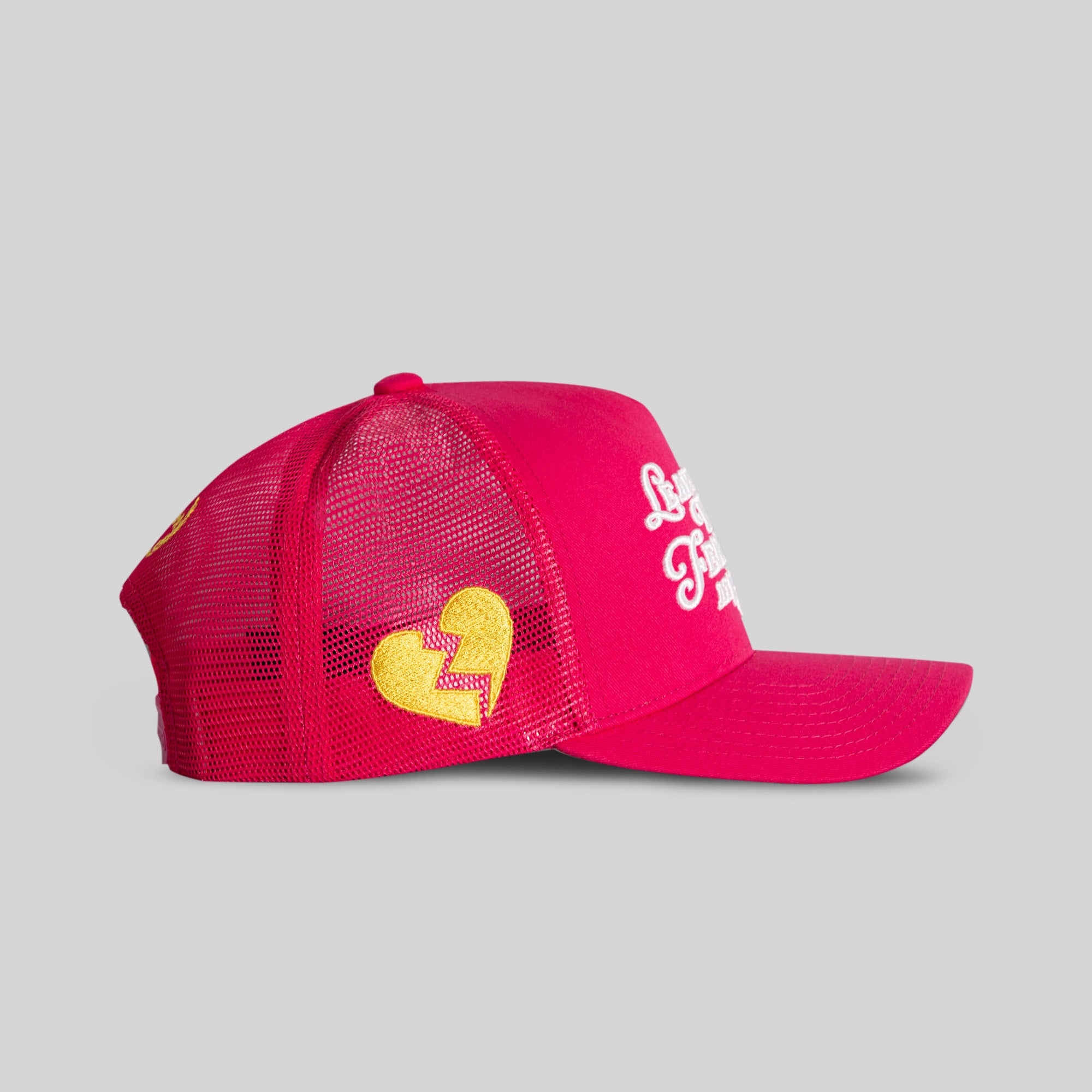 LEAVE YOUR FEELINGS NEON PINK TWILL MESH TRUCKER